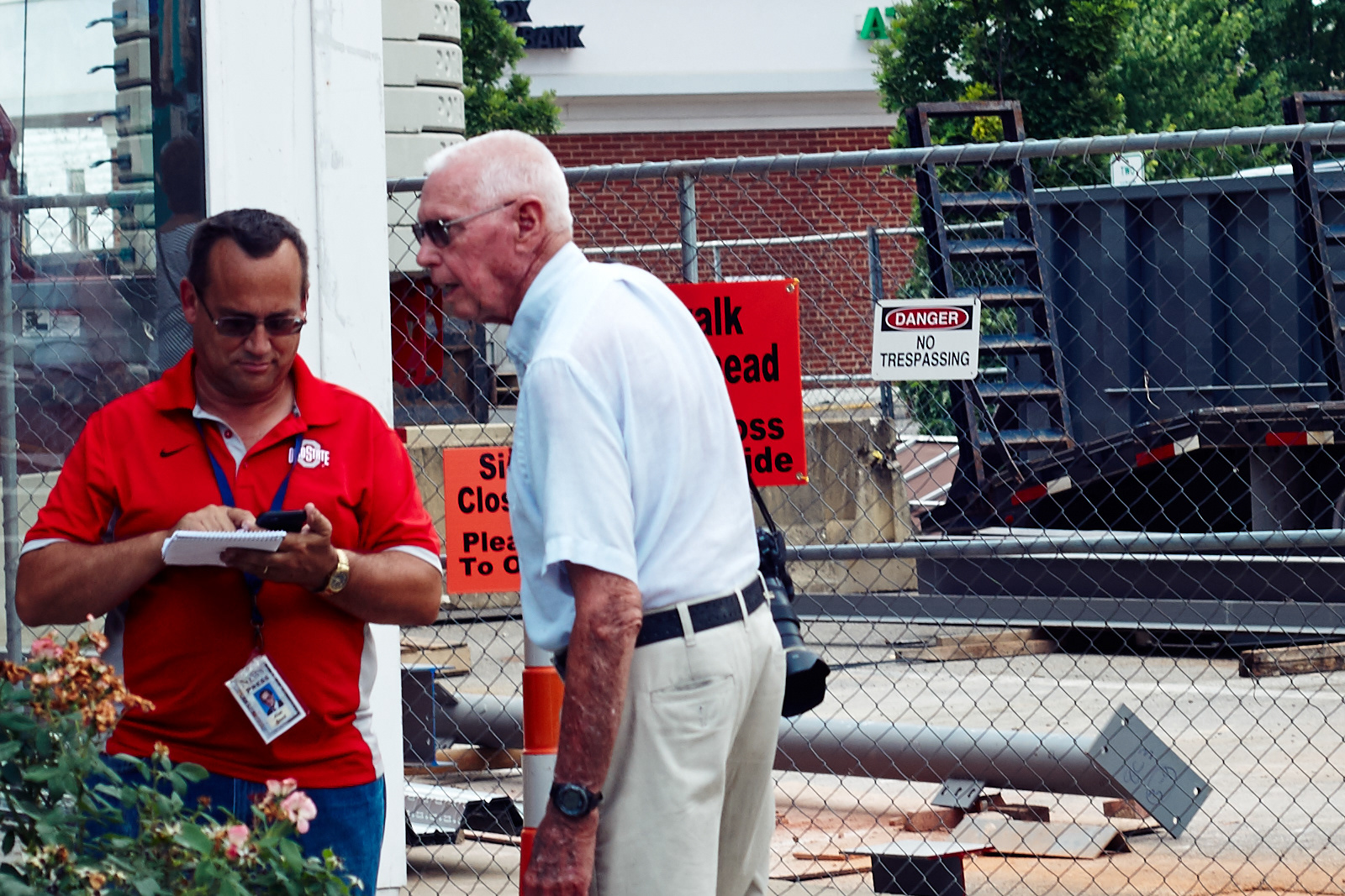 Alan Reed, left, and Virgil Shipley during the music and arts festival complete the Taking it to the Streets column for a Saturday paper.