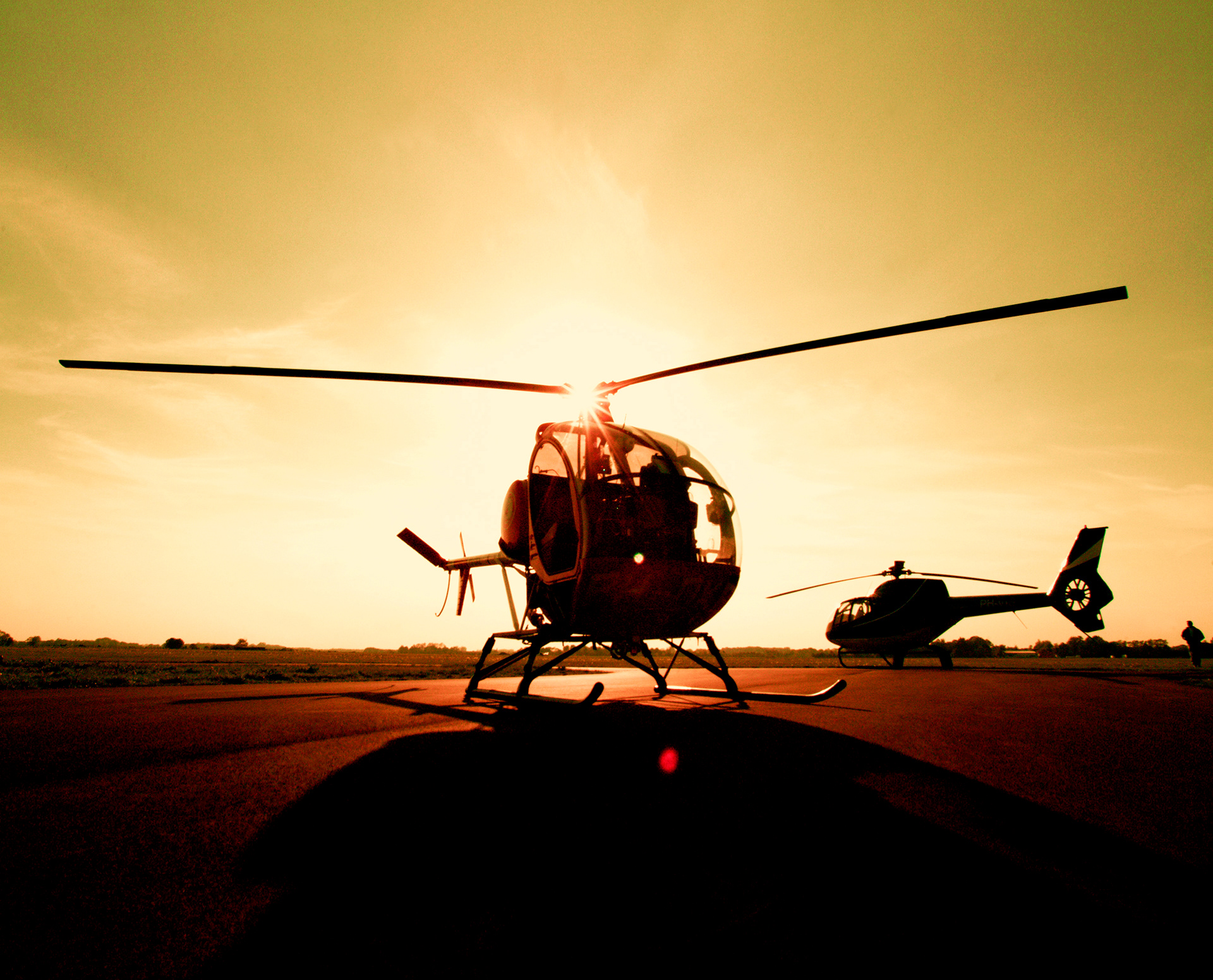 Taking photographs with the Hughes 300C & Eurocopter EC120