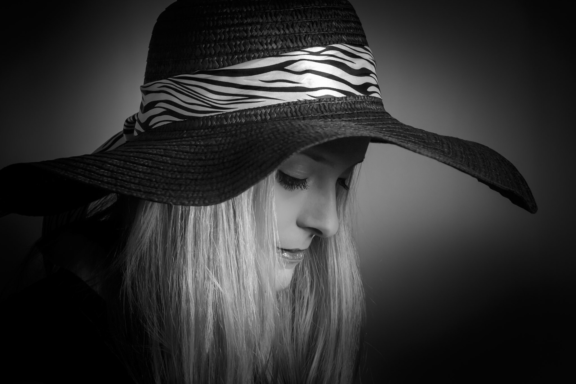 The lady and the black hat.