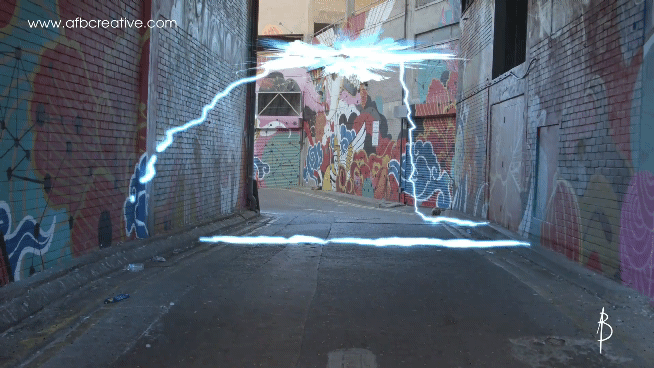 Animated GIF showing CG character teleporting into an alley in real stock footage.
