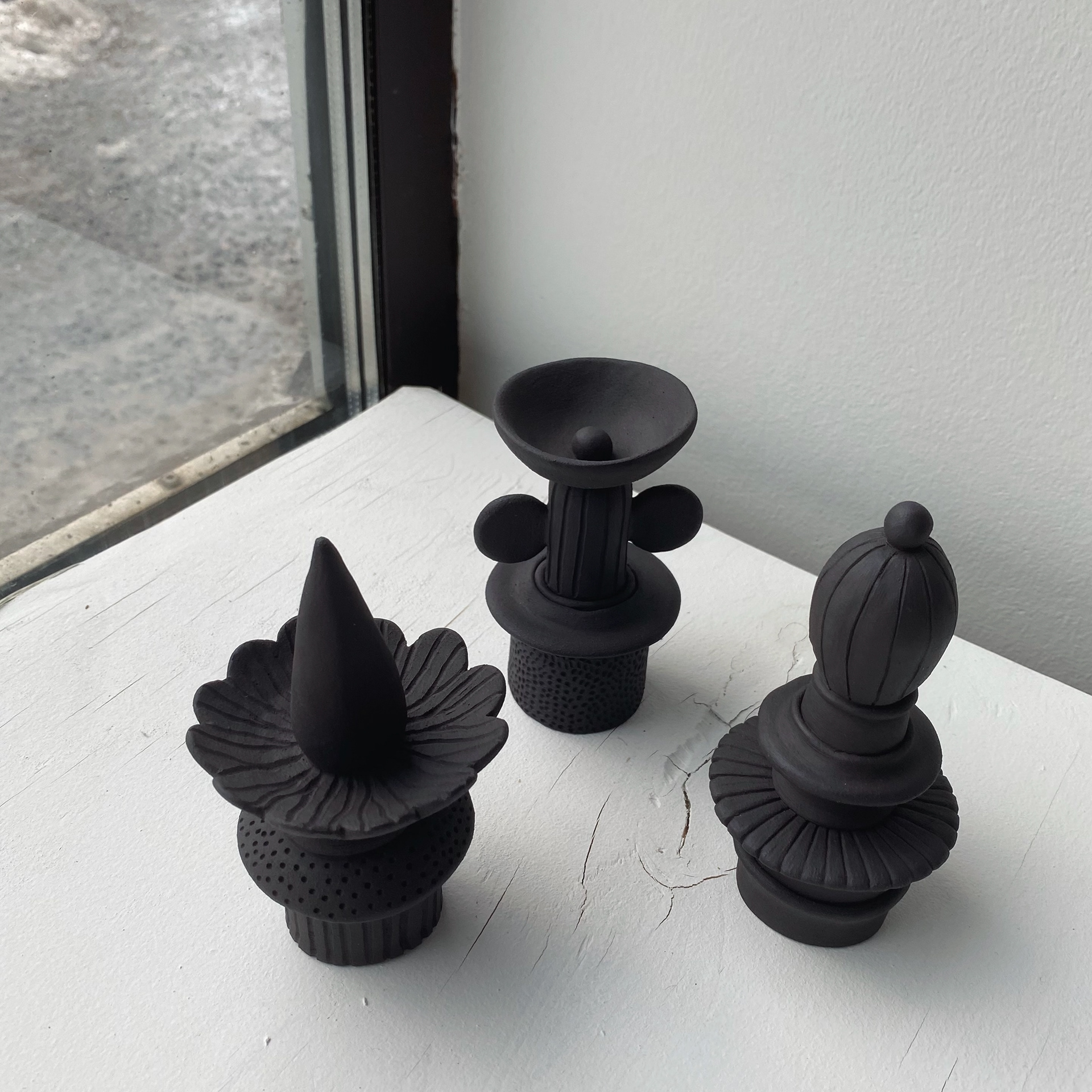 Geometric Whimsy, black clay fired in 1200 °C, 10 x 10 cm, 2023