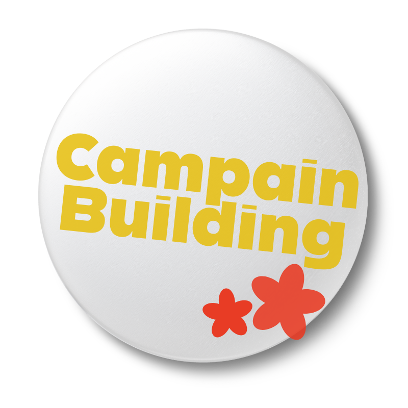 Round white button graphic with bold yellow text reading 'Campaign Building'' and playful flower icons. Designed for branding or digital marketing services related to social media strategy.