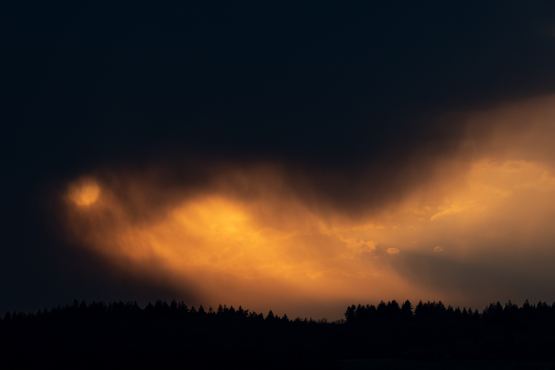 101/365 Sunlight through storm clouds