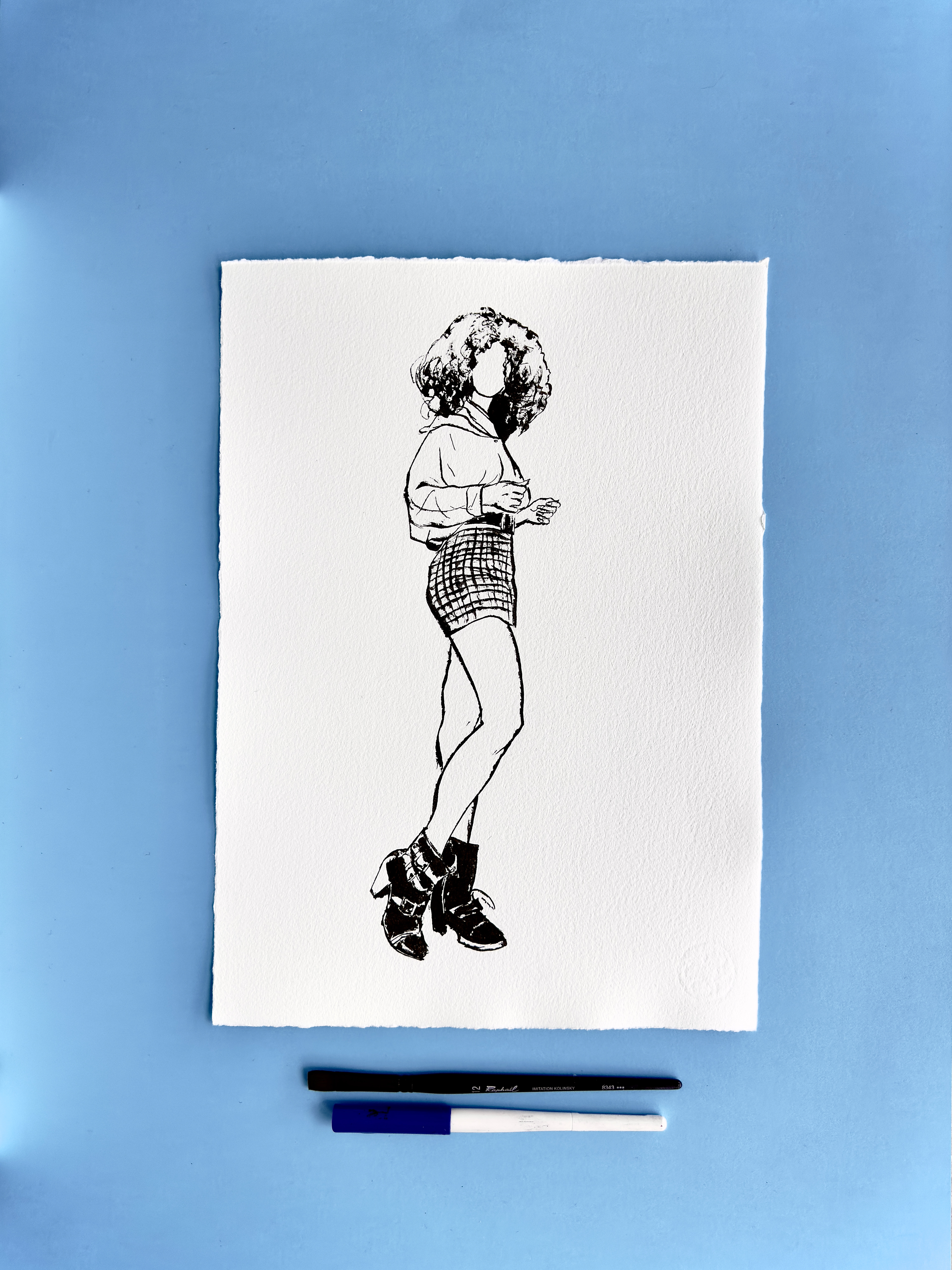 I DRAW YOU is an ongoing series of contemporary figure drawings exploring everyday bodies, fashion, and movement through expressive ink linework on textured cotton paper. Each piece captures real people in natural, unposed moments—walking, skating, taking selfies, or simply inhabiting their clothes—transforming daily gestures into minimal, dynamic portraiture.  Drawn with a combination of brush, parallel pen, and ink, the series focuses on gesture, proportion, and character, emphasising rhythm and immediacy over facial detail. Instead of traditional portrait likeness, the drawings celebrate silhouette, attitude, and personal style, making each figure both intimate and universal.  These original artworks sit at the crossroads of illustration, fashion drawing, and figurative art, making them ideal for collectors interested in line art, contemporary drawing, and minimal ink portraits. Every piece is hand-drawn on archival 250–300g paper, preserving the texture and spontaneity of the process.  Perfect for art lovers looking for unique figure drawings, modern ink artwork, or original works on paper that highlight the beauty of everyday bodies and the immediacy of the drawn line.