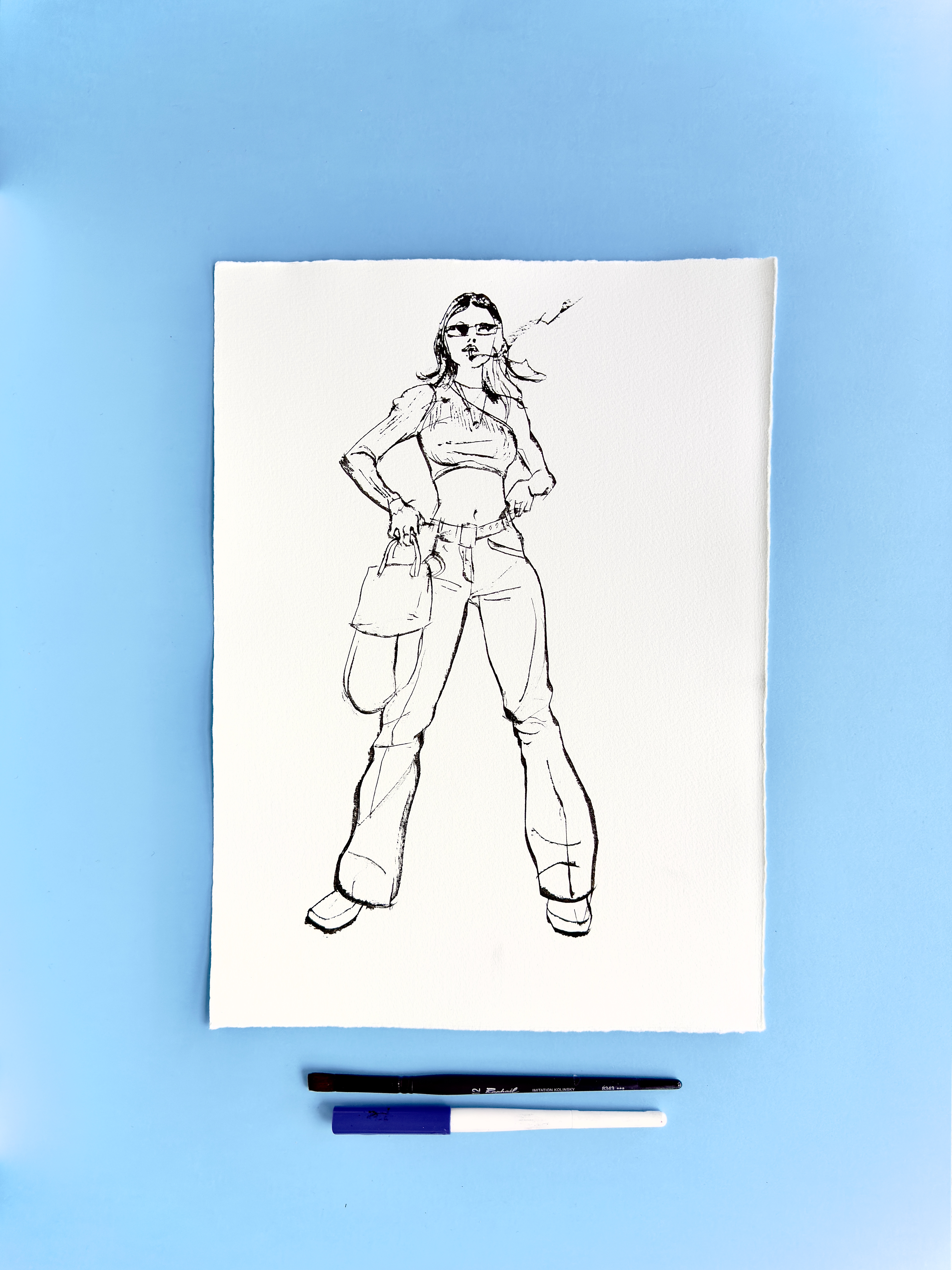 I DRAW YOU is an ongoing series of contemporary figure drawings exploring everyday bodies, fashion, and movement through expressive ink linework on textured cotton paper. Each piece captures real people in natural, unposed moments—walking, skating, taking selfies, or simply inhabiting their clothes—transforming daily gestures into minimal, dynamic portraiture.  Drawn with a combination of brush, parallel pen, and ink, the series focuses on gesture, proportion, and character, emphasising rhythm and immediacy over facial detail. Instead of traditional portrait likeness, the drawings celebrate silhouette, attitude, and personal style, making each figure both intimate and universal.  These original artworks sit at the crossroads of illustration, fashion drawing, and figurative art, making them ideal for collectors interested in line art, contemporary drawing, and minimal ink portraits. Every piece is hand-drawn on archival 250–300g paper, preserving the texture and spontaneity of the process.  Perfect for art lovers looking for unique figure drawings, modern ink artwork, or original works on paper that highlight the beauty of everyday bodies and the immediacy of the drawn line.