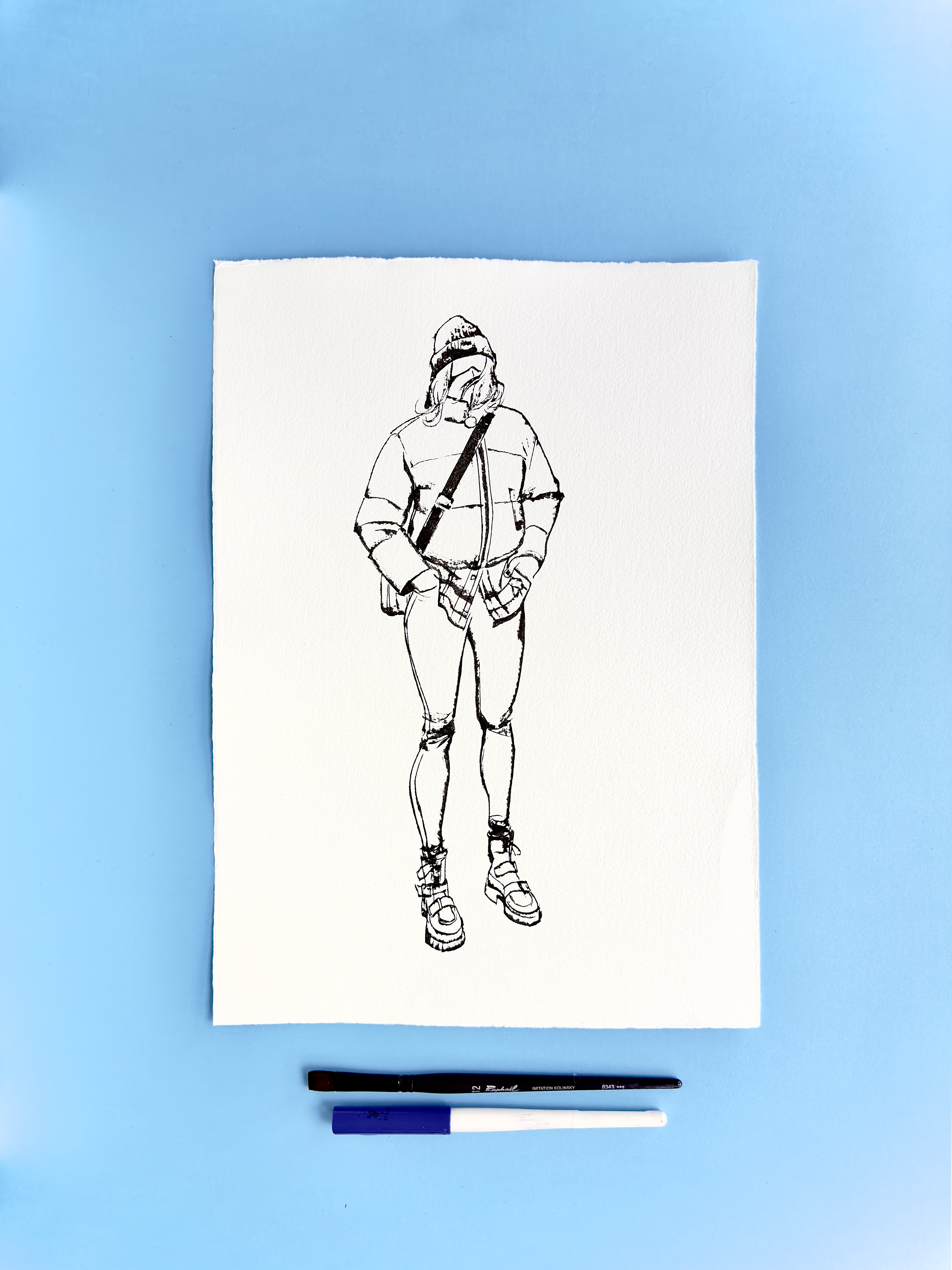 I DRAW YOU is an ongoing series of contemporary figure drawings exploring everyday bodies, fashion, and movement through expressive ink linework on textured cotton paper. Each piece captures real people in natural, unposed moments—walking, skating, taking selfies, or simply inhabiting their clothes—transforming daily gestures into minimal, dynamic portraiture.  Drawn with a combination of brush, parallel pen, and ink, the series focuses on gesture, proportion, and character, emphasising rhythm and immediacy over facial detail. Instead of traditional portrait likeness, the drawings celebrate silhouette, attitude, and personal style, making each figure both intimate and universal.  These original artworks sit at the crossroads of illustration, fashion drawing, and figurative art, making them ideal for collectors interested in line art, contemporary drawing, and minimal ink portraits. Every piece is hand-drawn on archival 250–300g paper, preserving the texture and spontaneity of the process.  Perfect for art lovers looking for unique figure drawings, modern ink artwork, or original works on paper that highlight the beauty of everyday bodies and the immediacy of the drawn line.