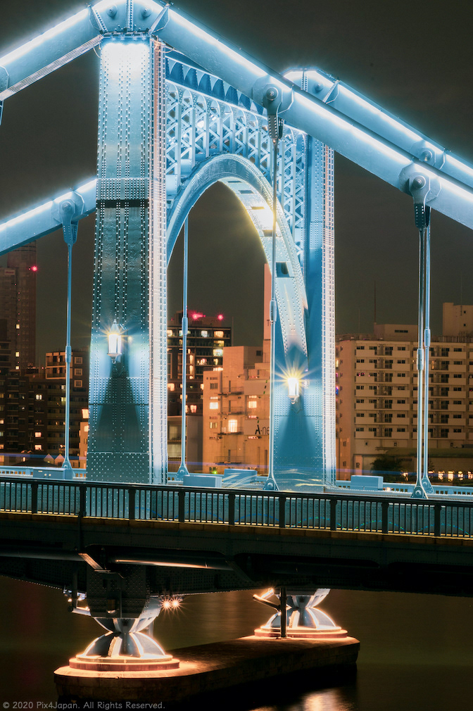 Lights on Self-Anchored Suspension Bridge over River