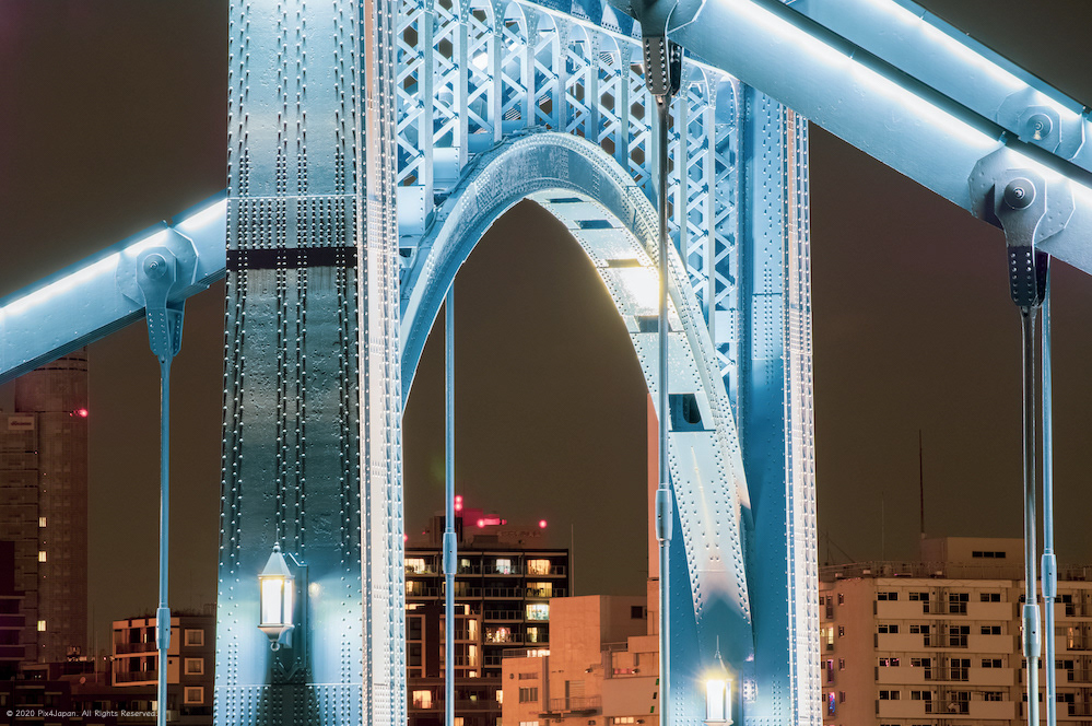 Lights on Self-Anchored Suspension Bridge over River