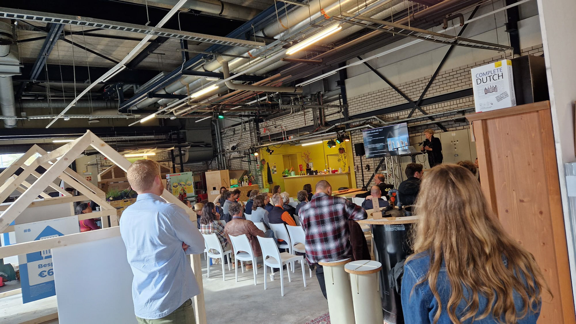 Listening to one of the talks.