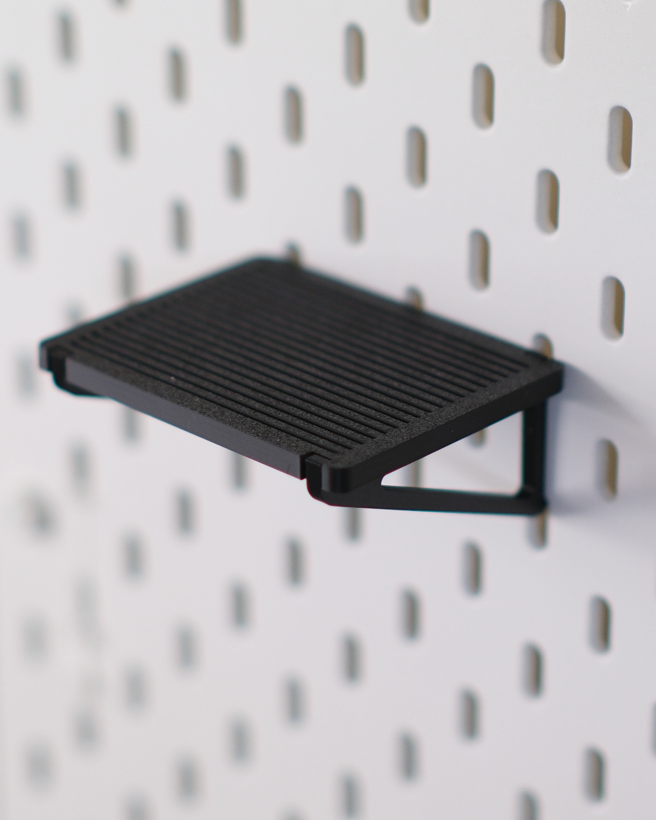 05 ikea_skadis_minimal_toy_display_shelf_snap_on_pegboard_shelf_for_mini_figures