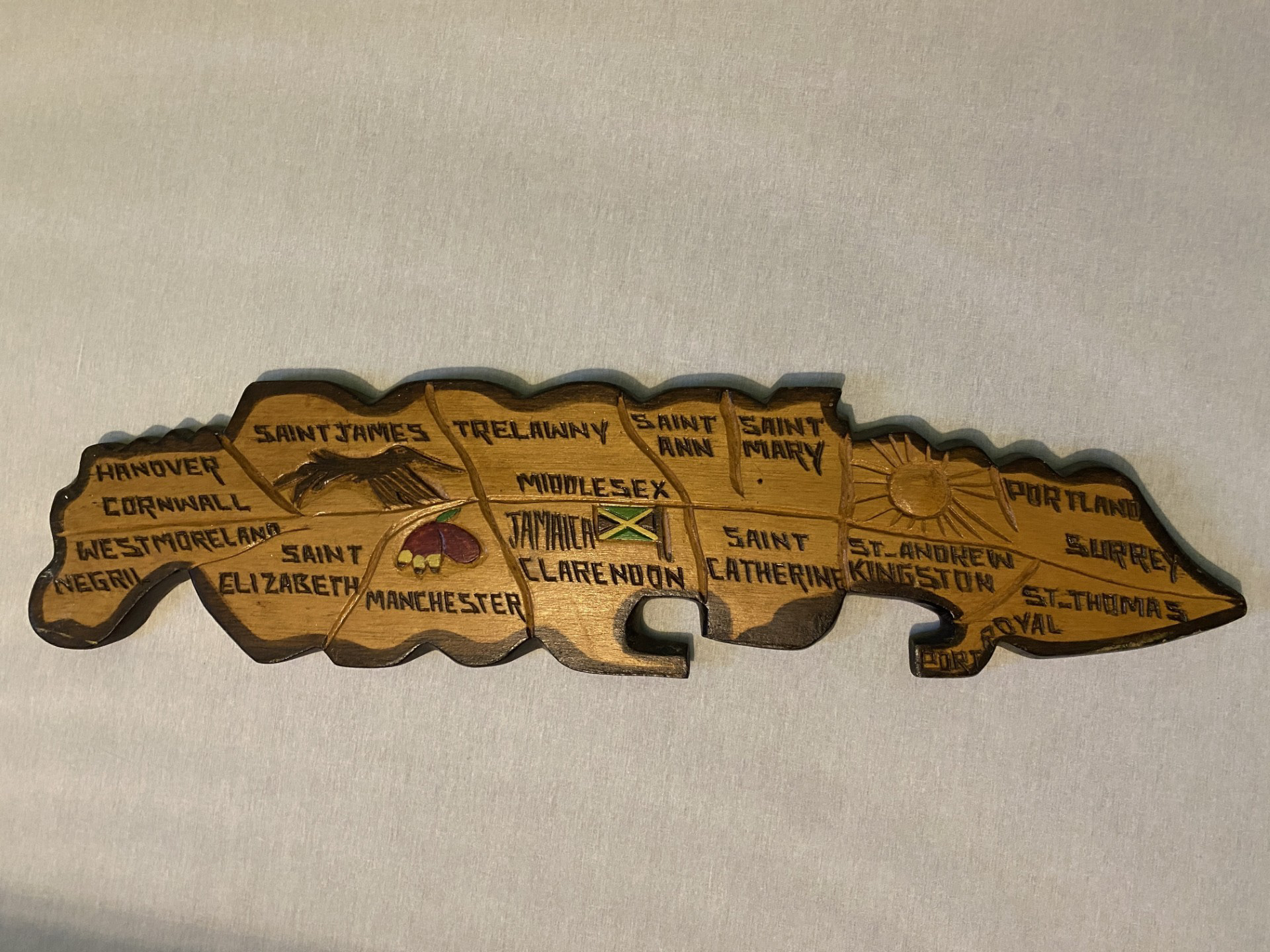 Lauren’s Object: “My object is a map of Jamaica that was given from my grandad to my mum in the 80s, I think. Every Caribbean house has one. Plywood, I think it’s made from. It’s got all the different areas of Jamaica on it. It’s always been at the top of my door. So, that’s where I’ve walked in and out all throughout my life, and it’s always been in every house we’ve had. So, yeah, I feel like it’s a good representation of me.” Credit: Lauren Fitzpatrick