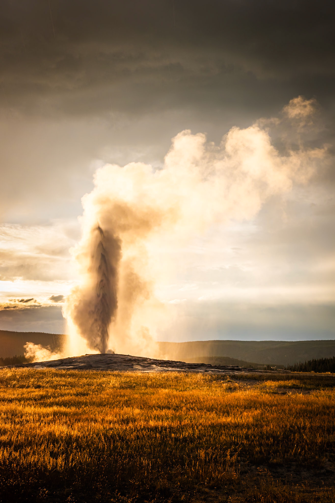 Yellowstone - Old Faithful at Dusk with Light Rain (3:2)