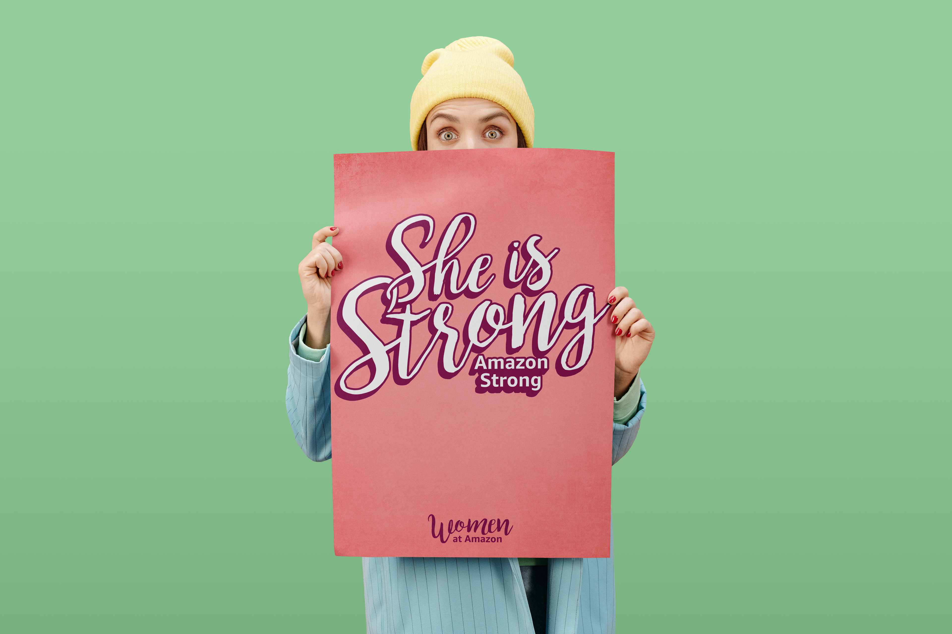 woman holding up a poster
