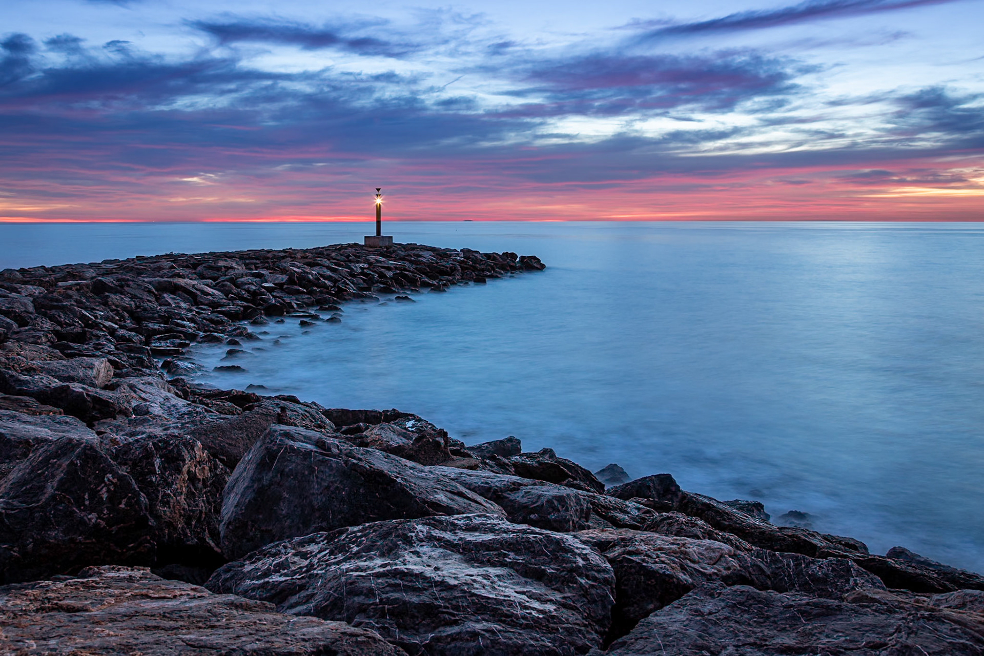 Port Ginesta harbour wall located near the busy holiday town of Castelldefels which is close to Barcelona.