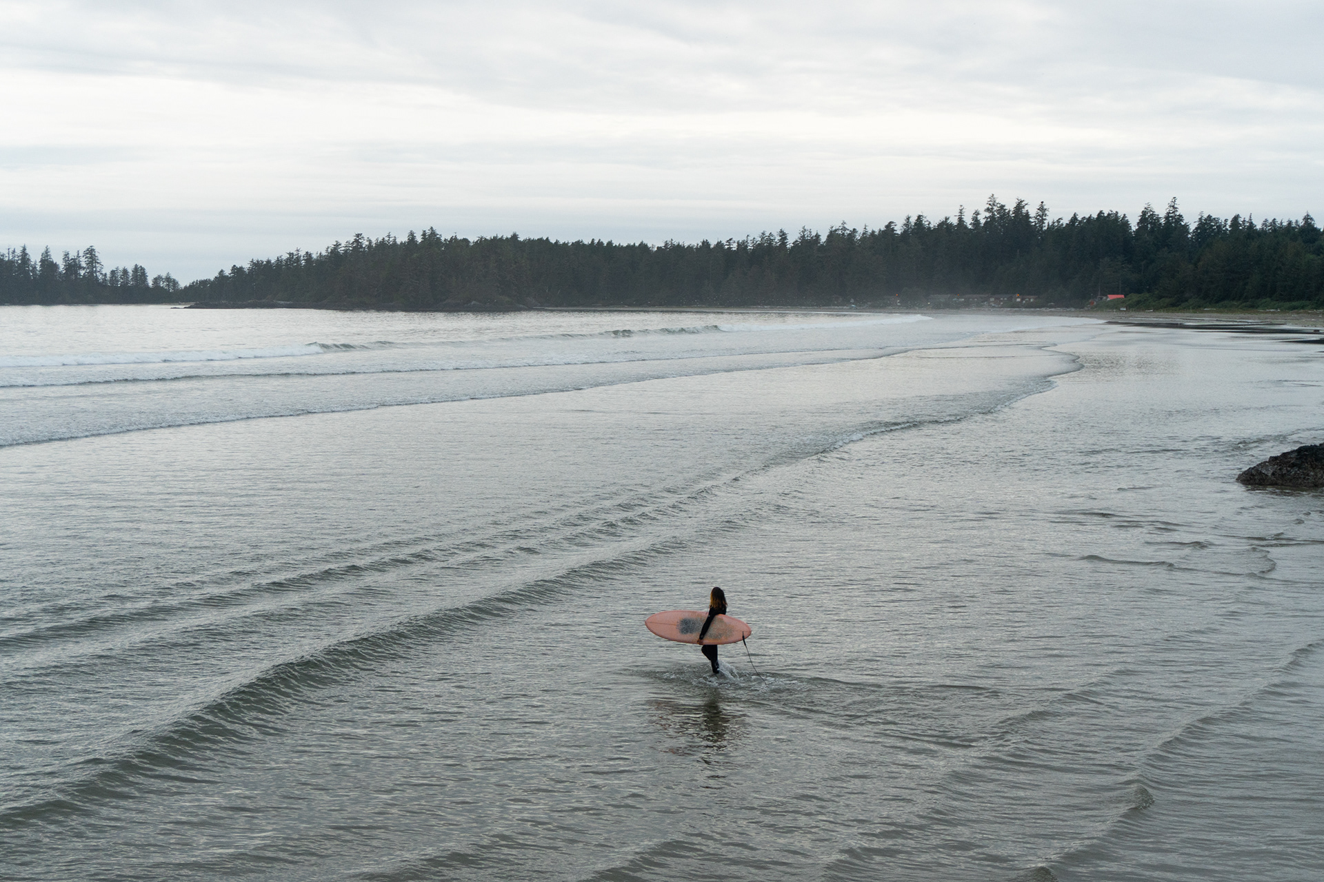 A surfer in Tofino, Canada.