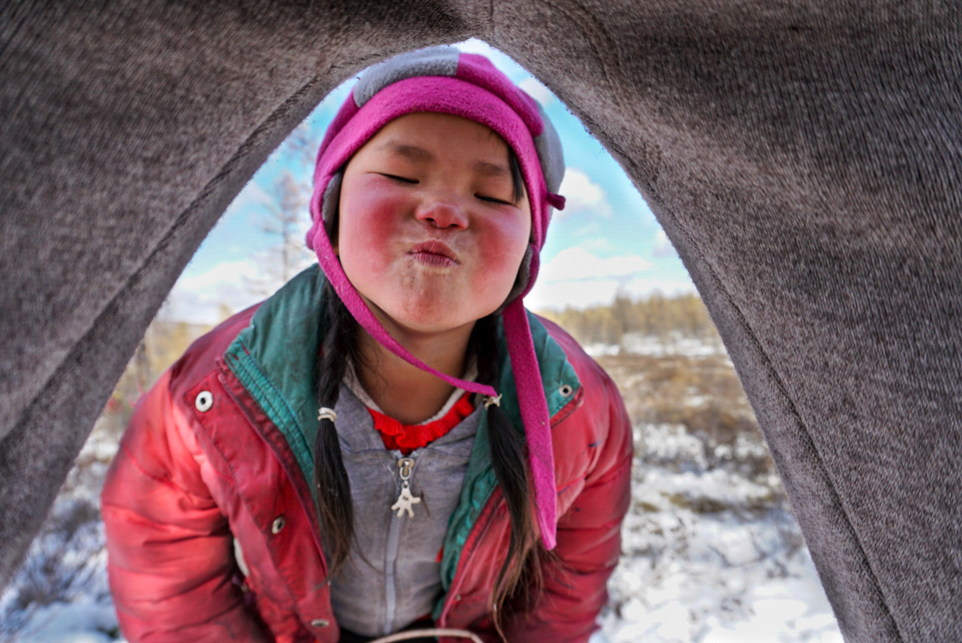 A photo of "Tsetseg" which translates to "blooming". Doesn't she blossom? Mongolia.