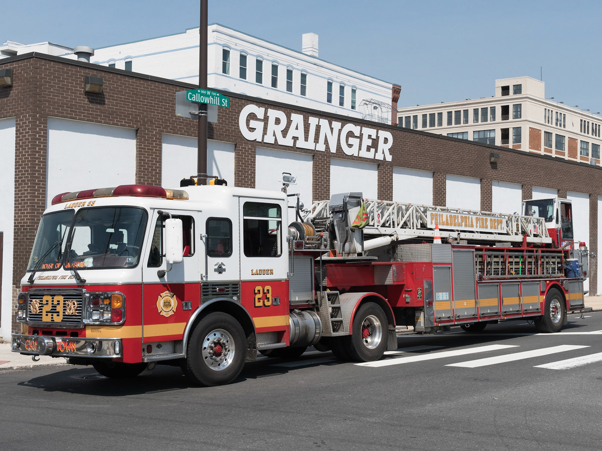 Philadelphia Box 391, N. 8th Street and Callowhill Street. Multiple dumpsters extended to an occupied 5 story commercial building.