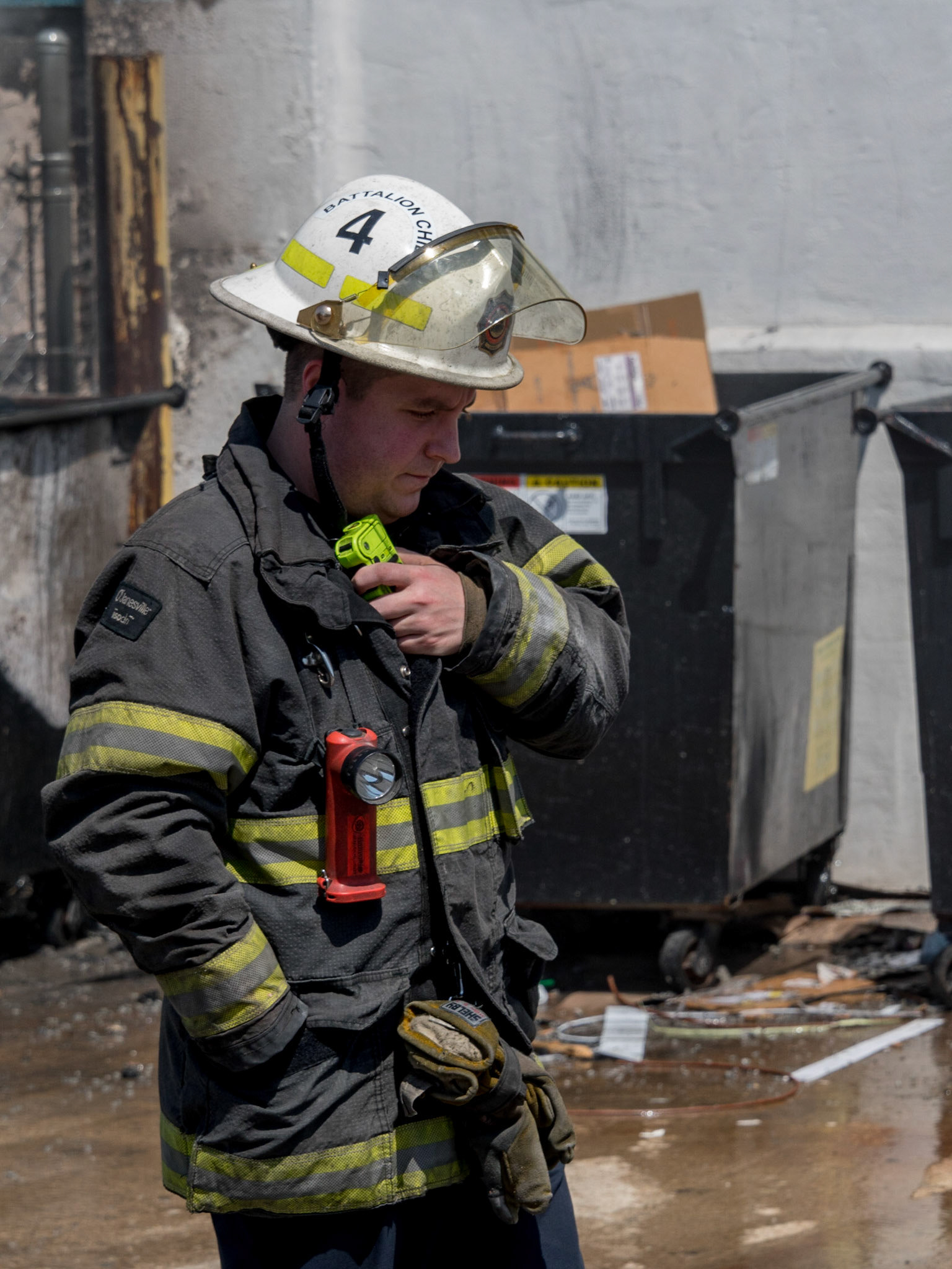 Philadelphia Box 391, N. 8th Street and Callowhill Street. Multiple dumpsters extended to an occupied 5 story commercial building.
