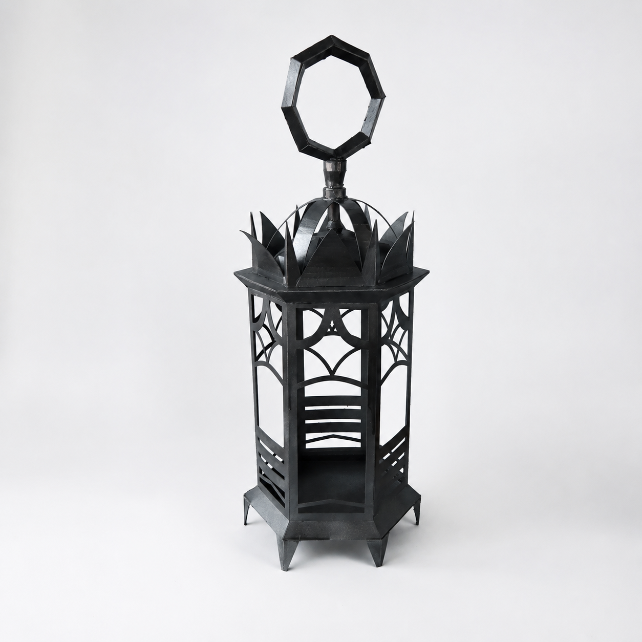 A cardboard and spray paint lamp sculpture