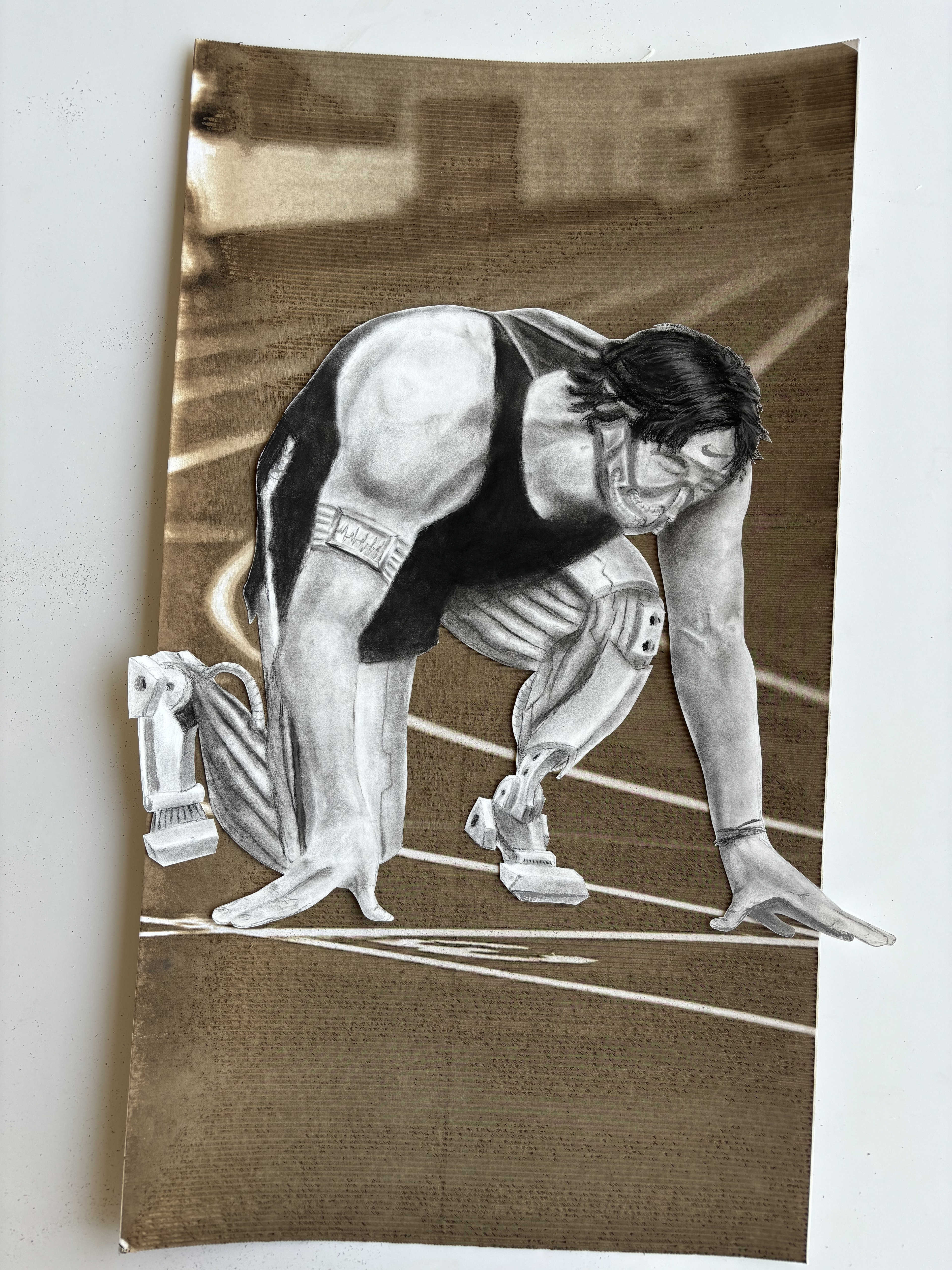 A charcoal and laser-etched self-portait (Spring 2024).