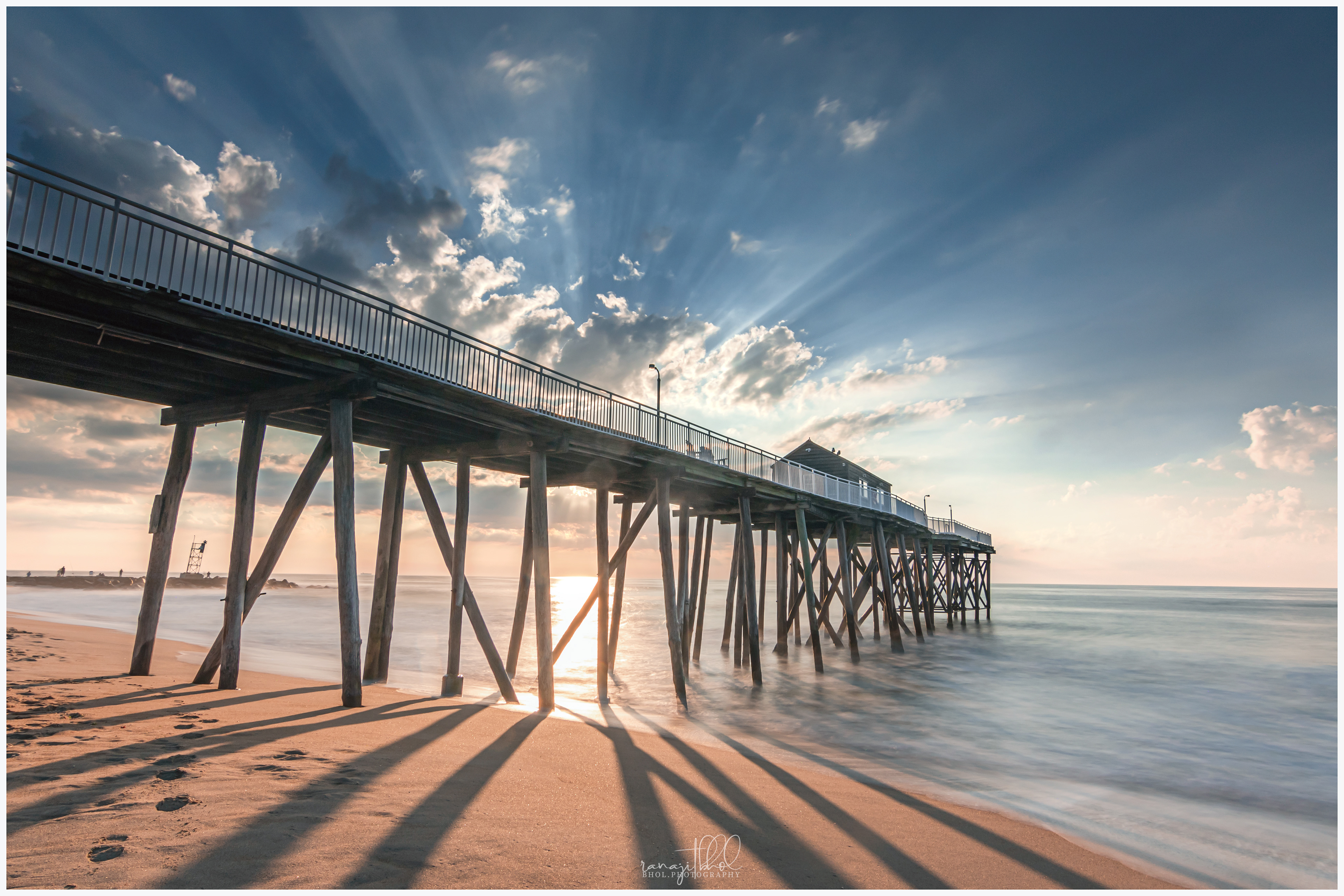 Dramatic sky over the Belmar Beach Pier, NJ