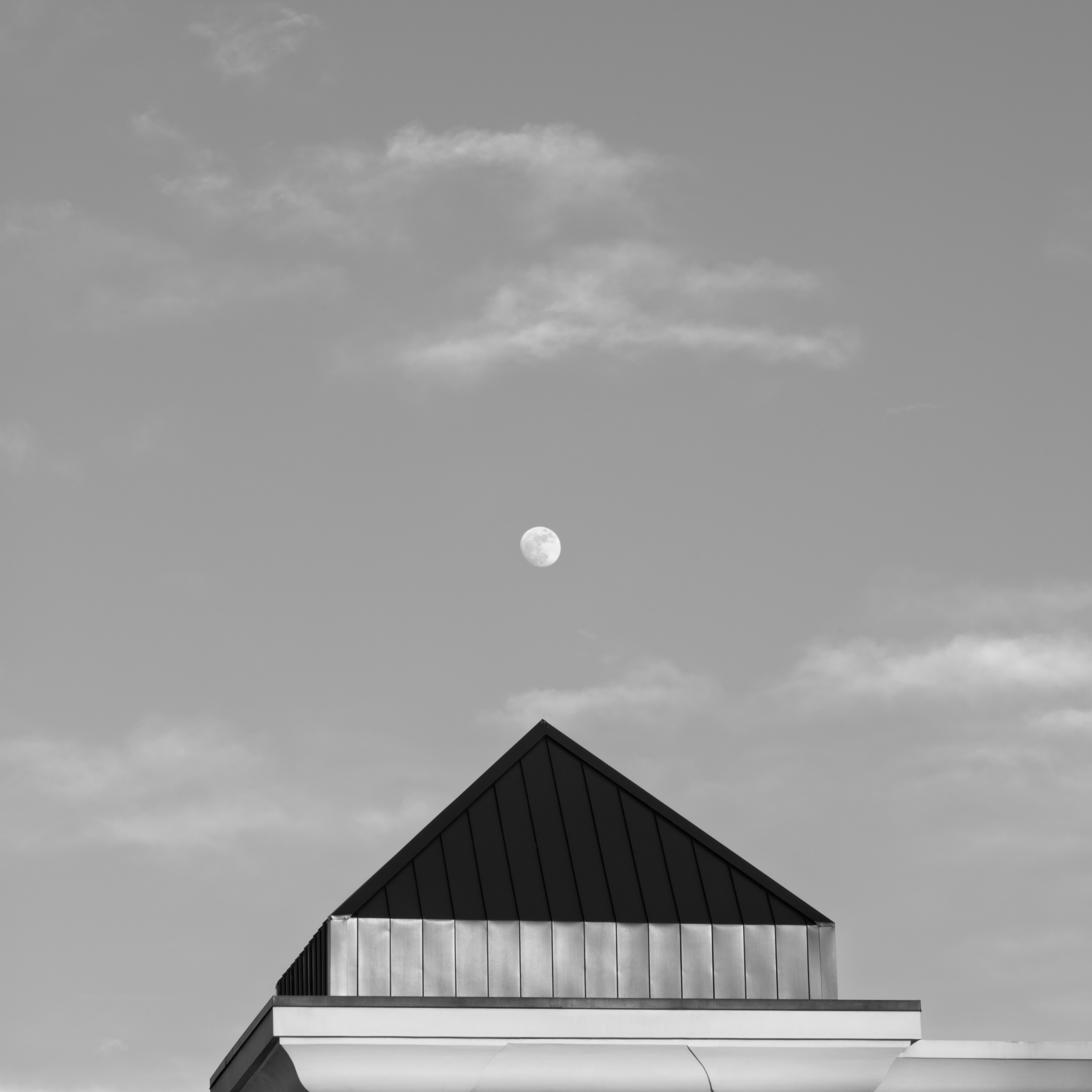 Moonrise over sheet metal pyramid