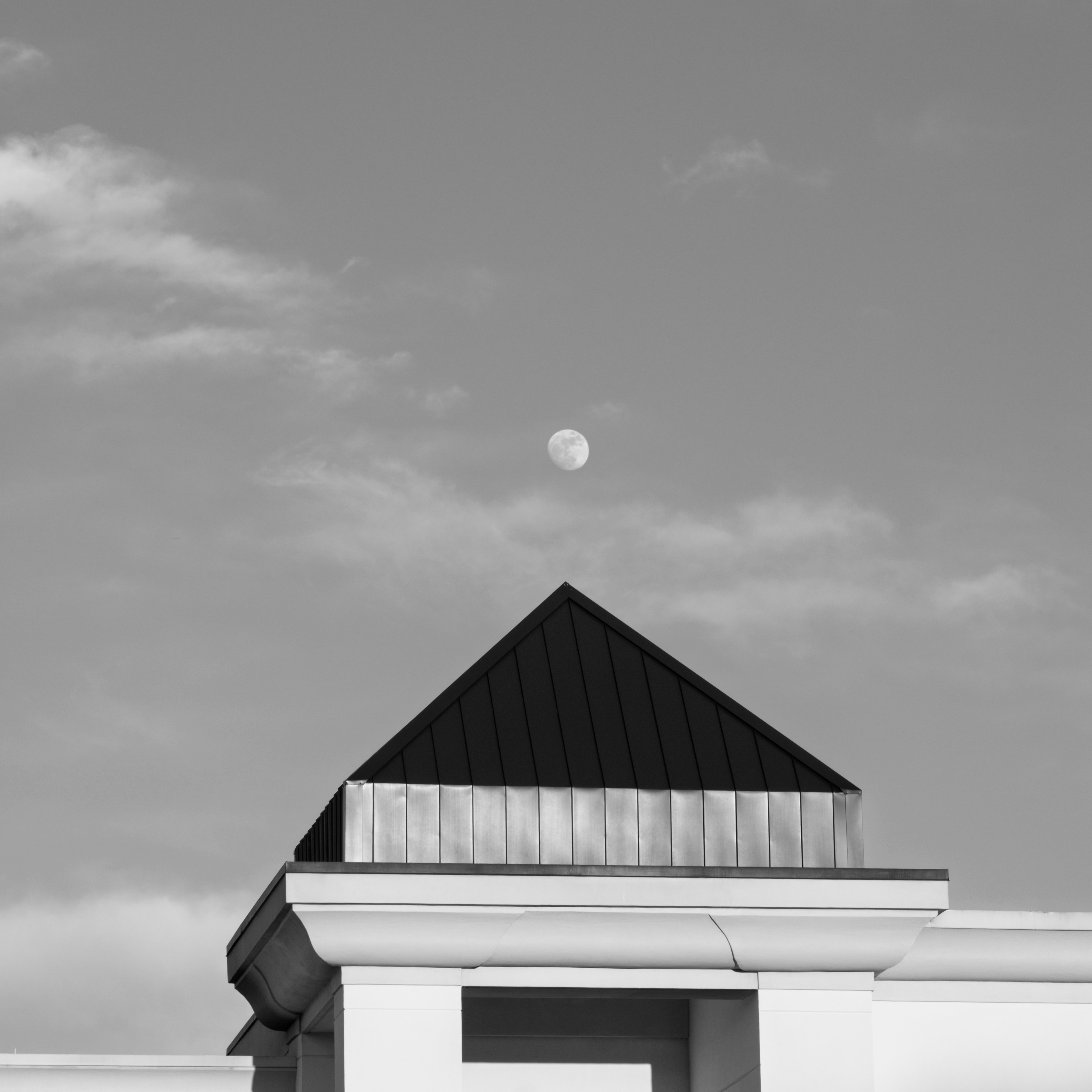 Moonrise over sheet metal pyramid