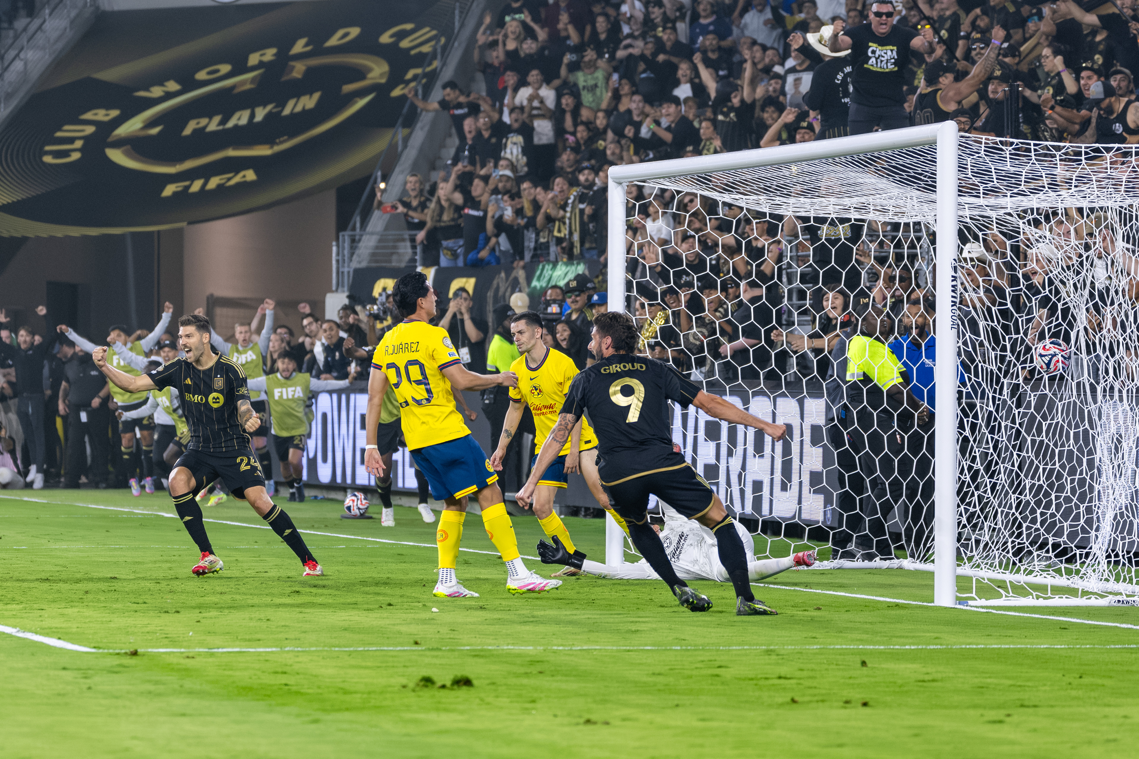 LAFC soccer players celebrate a goal in a FIFA Club World Cup play-in match at BMO Stadium in Los Angeles, CA