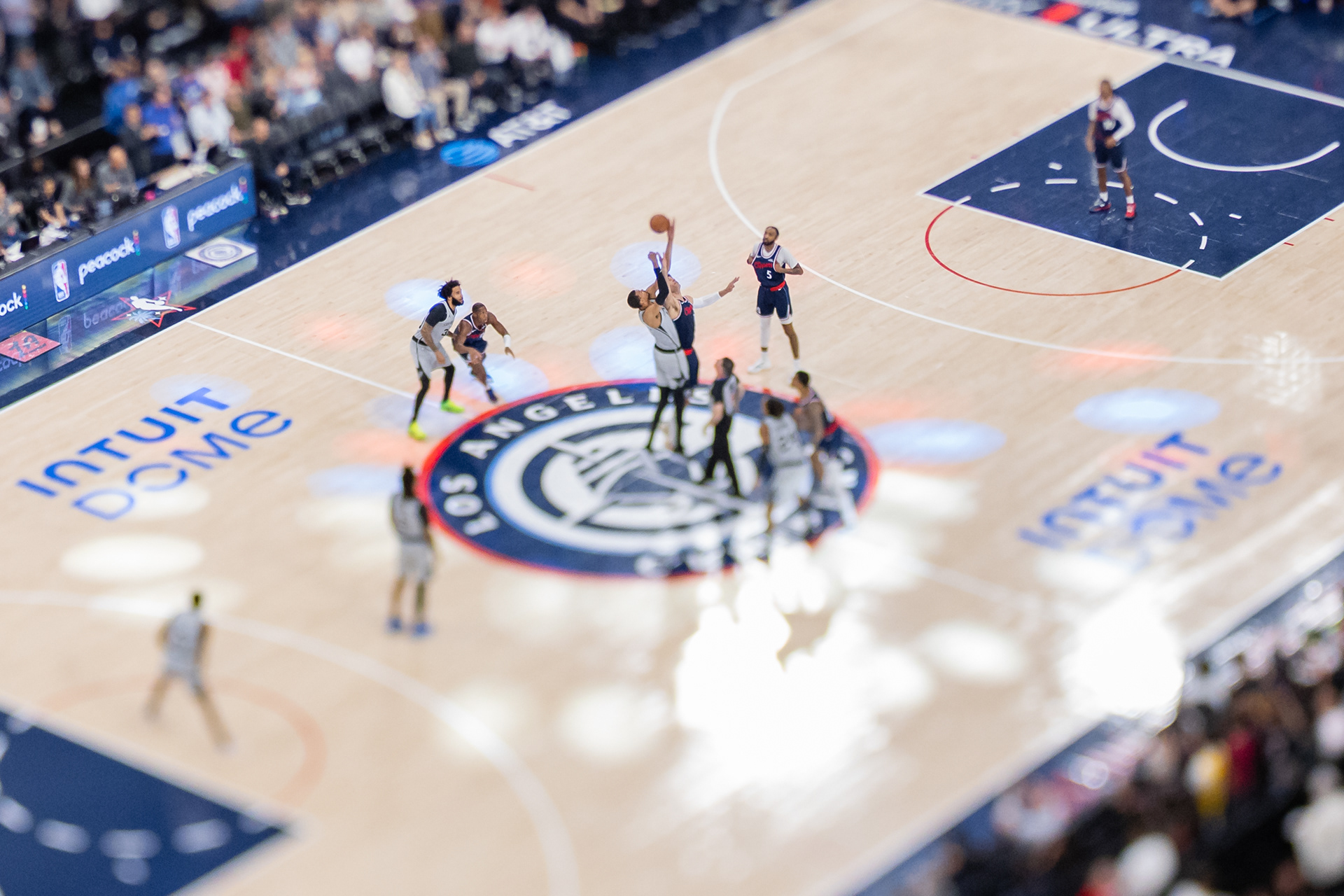 San Antonio Spurs center Victor Wembanyama and LA Clippers center Brook Lopez compete for the opening tip during an NBA basketball game at Intuit Dome in Los Angeles, CA