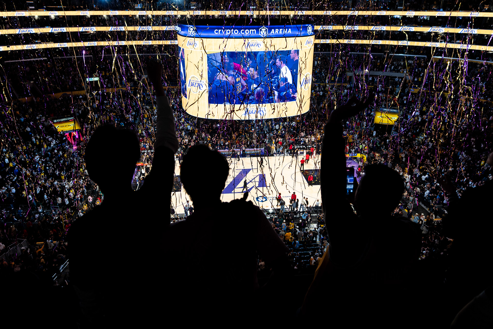 Los Angeles Lakers fan celebrate after a victory in an NBA basketball game at Crypto.com Arena in Los Angeles, CA