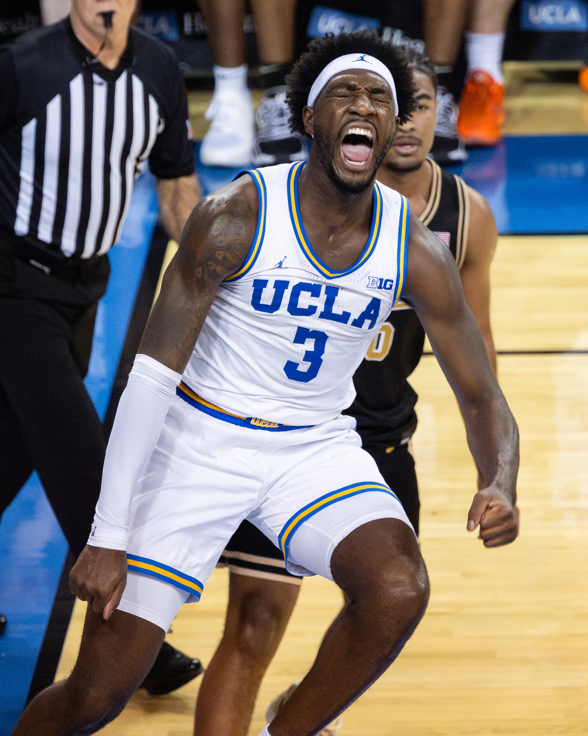 UCLA forward Eric Dailey, Jr. celebrates after a dunk during an NCAA basketball game at Pauley Pavilion in Los Angeles, CA