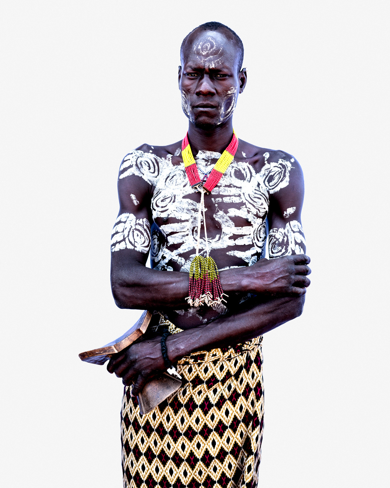 Portrait of a man from the Karo community with traditional body painting, Lower Omo Valley, Ethiopia, 2025.
