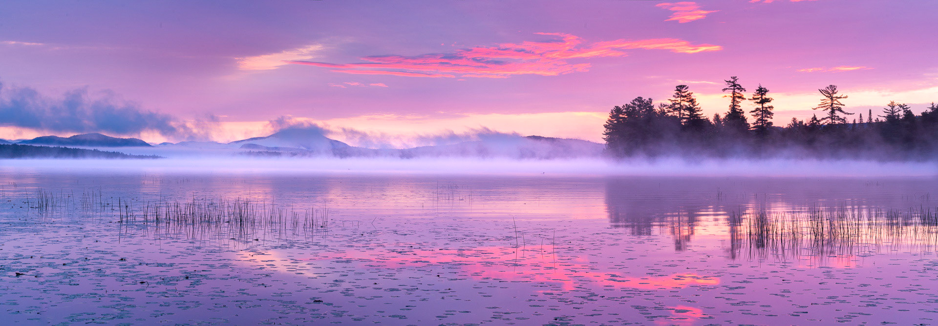 30 September 2018: Sunrise at Raquette Lake in the Adirondack Mountains, NY.