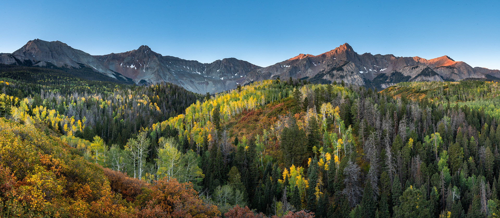 1 October 2019: Sunrise view of Mears Peak on County Road 9 in Colorado