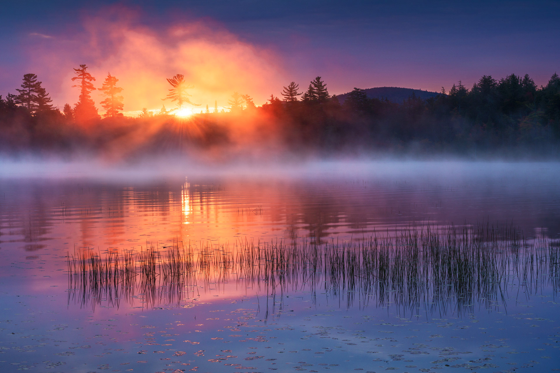30 September 2018: Sunrise at Raquette Lake in the Adirondack Mountains, NY.