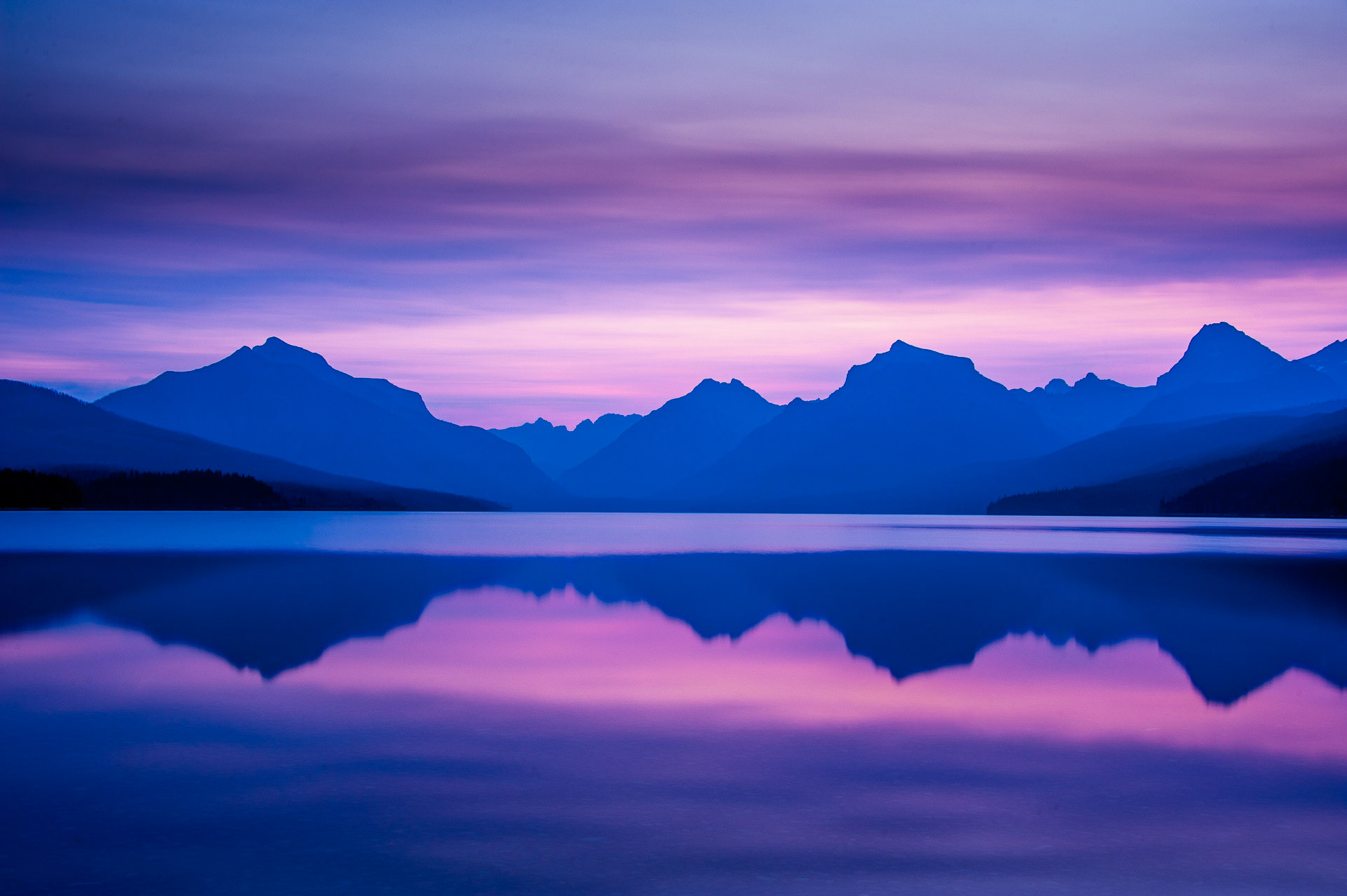 20 August 2012: Sunrise at Lake McDonald from Apgar Village in Glacier National Park, MT