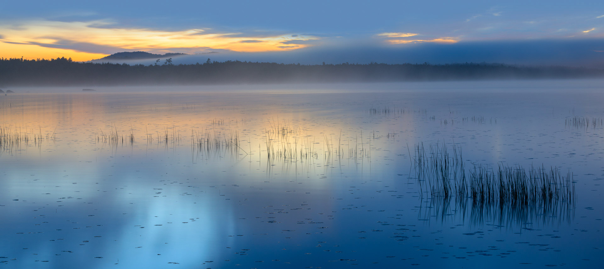 27 September 2018: Sunrise at Raquette Lake in the Adirondack Mountains, NY.