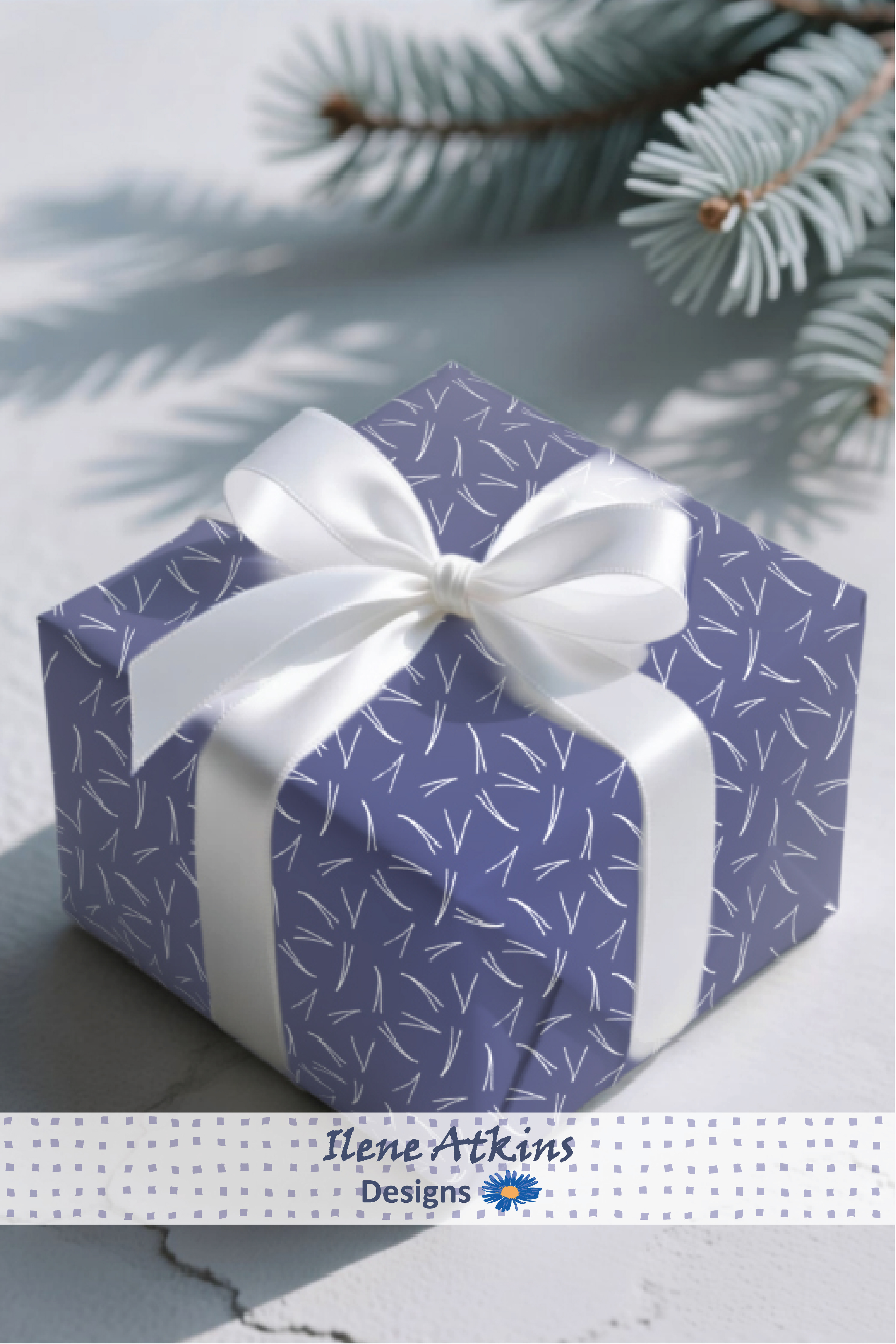 Pines in the Snow pattern on a pretty ribboned gift box featuring french blue patterned wrapping paper