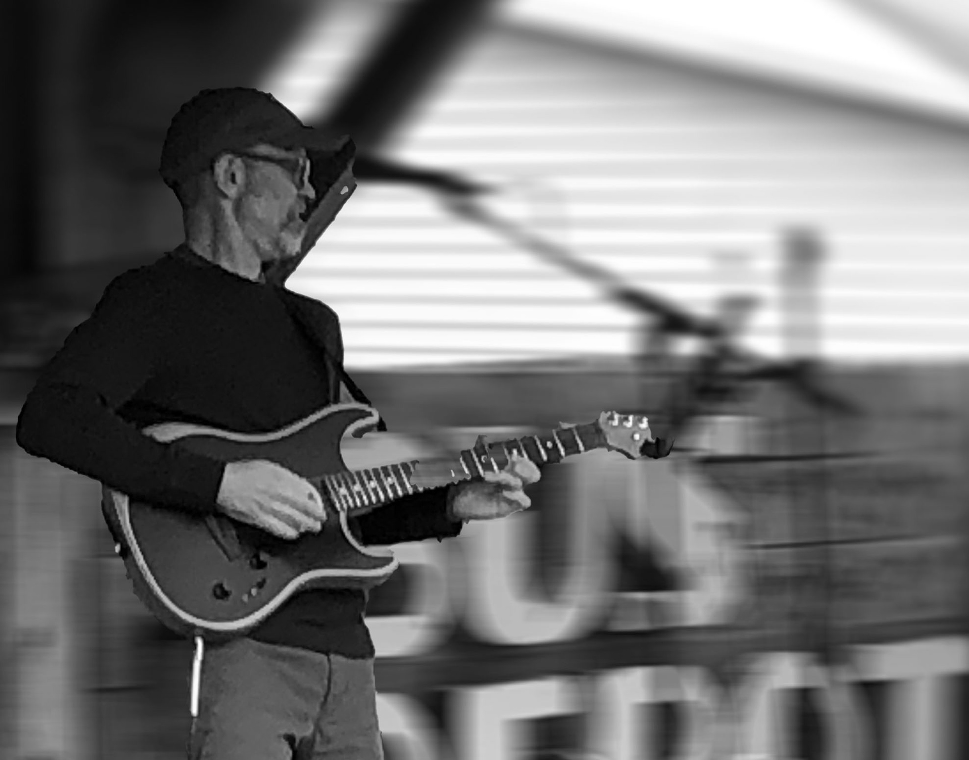 Johnathon North: Guitar, Vocals · Johnathon spent years touring with bands throughout the Midwest. He was the principal writer and singer for a traveling rock band. With record label and publishing company support, some of his songs landed on mainstream radio, television, and film. When he’s not slinging his Stratocaster or PRS with The Dune Brothers, Johnathon also plays with Rock Hat, Manitou Blues, and solo at area venues.
