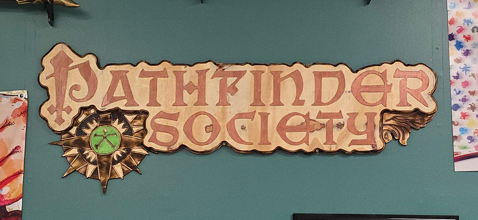 Nerd HQ had a customer present them with this super nice wooden plaque for Pathfinder society on the night of the very first game in the new lodge. They did it free of charge, and it's a REALLY nice plaque. 