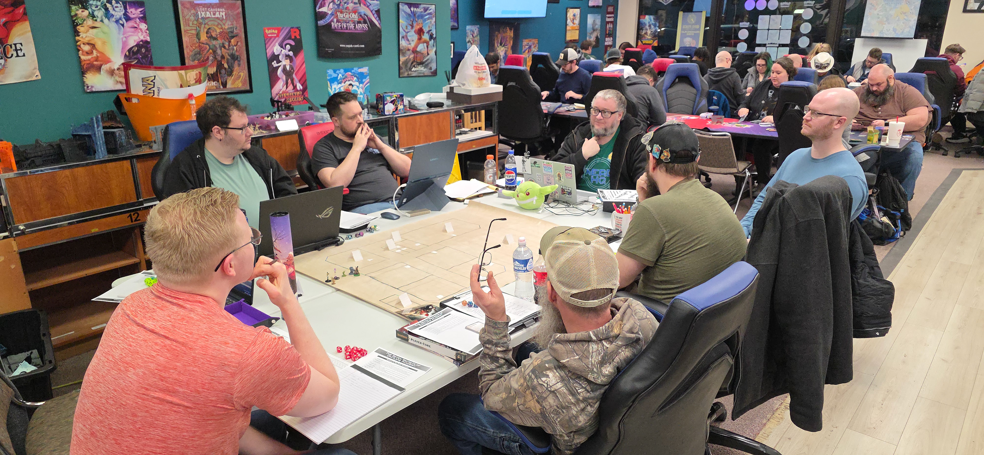 I think Fibbs was running The Secrets of Dacilane Academy in this photo. There are 7 people at the table including me, but the guy in the blue was a walk-in that just wanted to watch. 