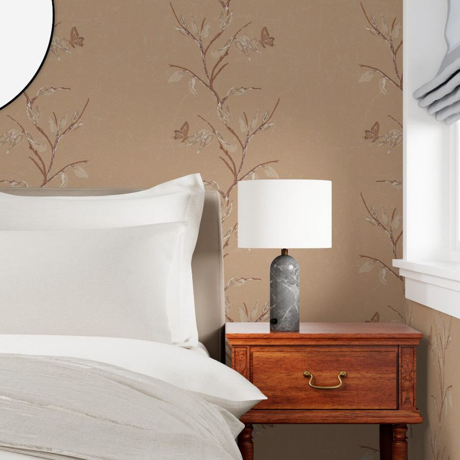 An airy pattern of fine stems and small butterflies rising with lightness. Its sandy ocher hue evokes the softness of a garden in late summer.