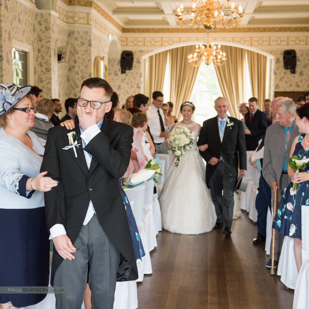 Rushpool Hall Wedding an emotional groom sees his bride walk down the aisle