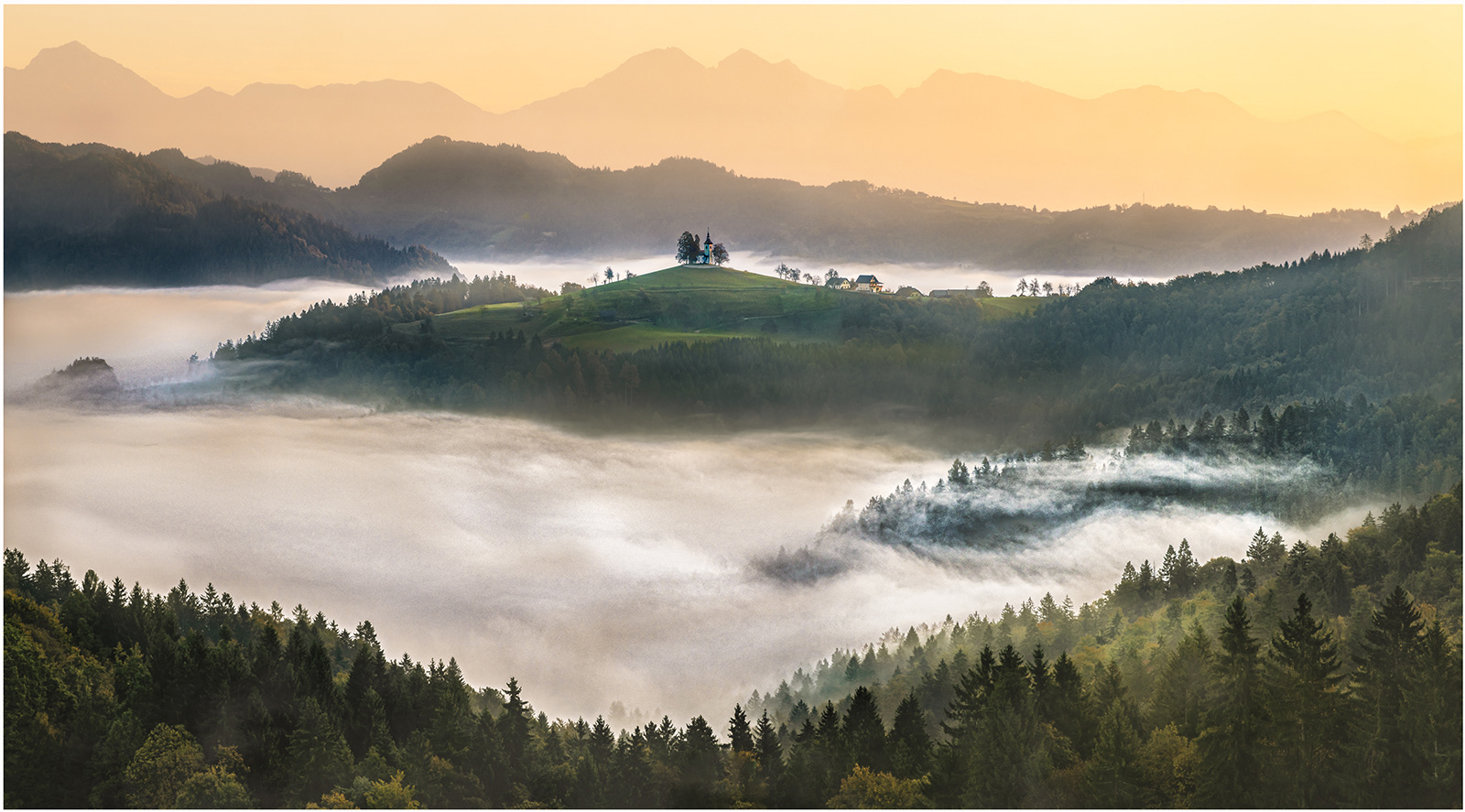 1st : "Cloud inversion in the valley, Julian Alps" by Anne Jones