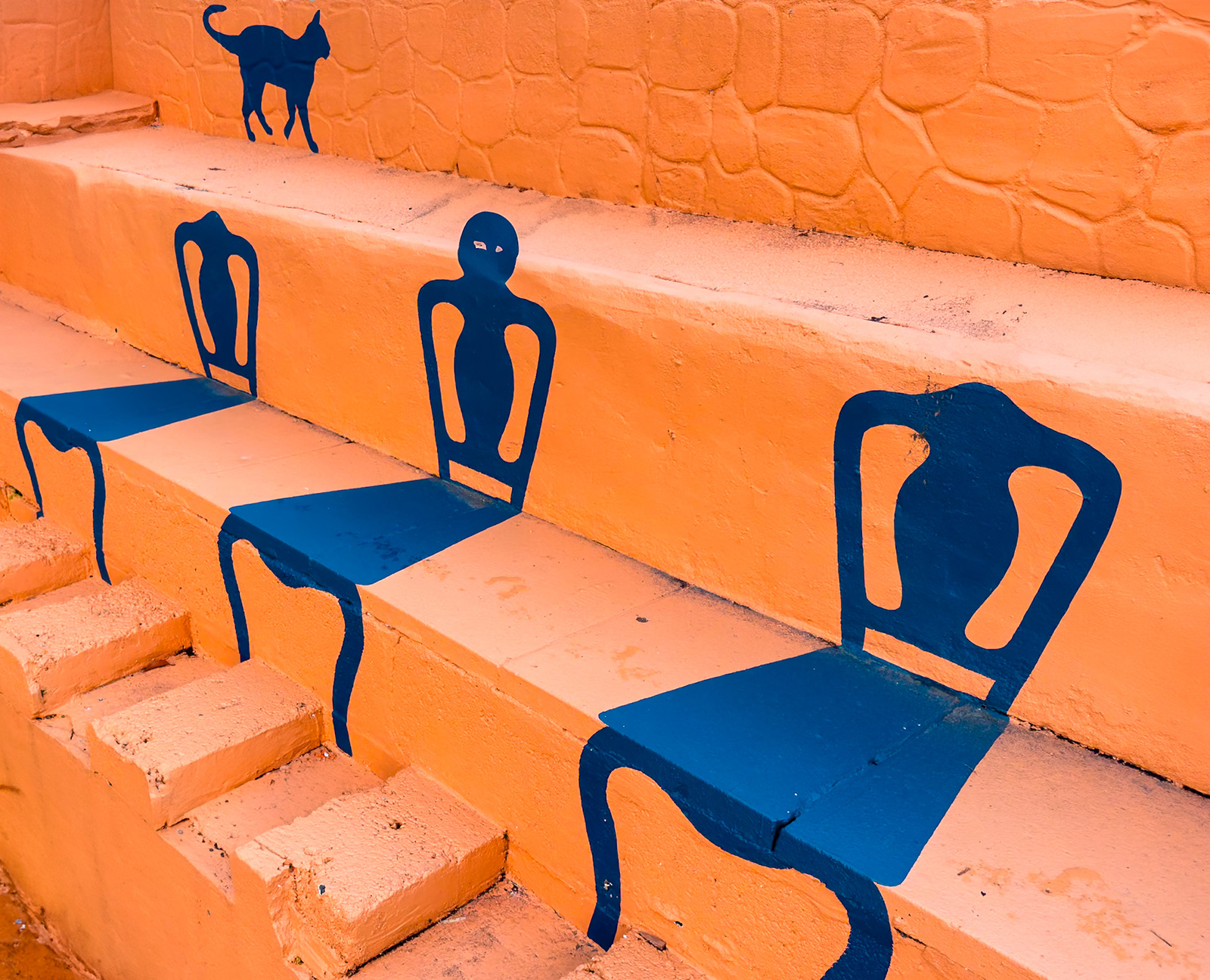 "Cat and Chairs"