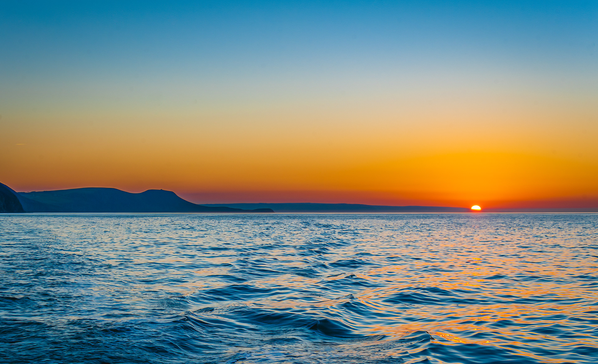 Sunset over Cardigan Island and Cardigan Bay