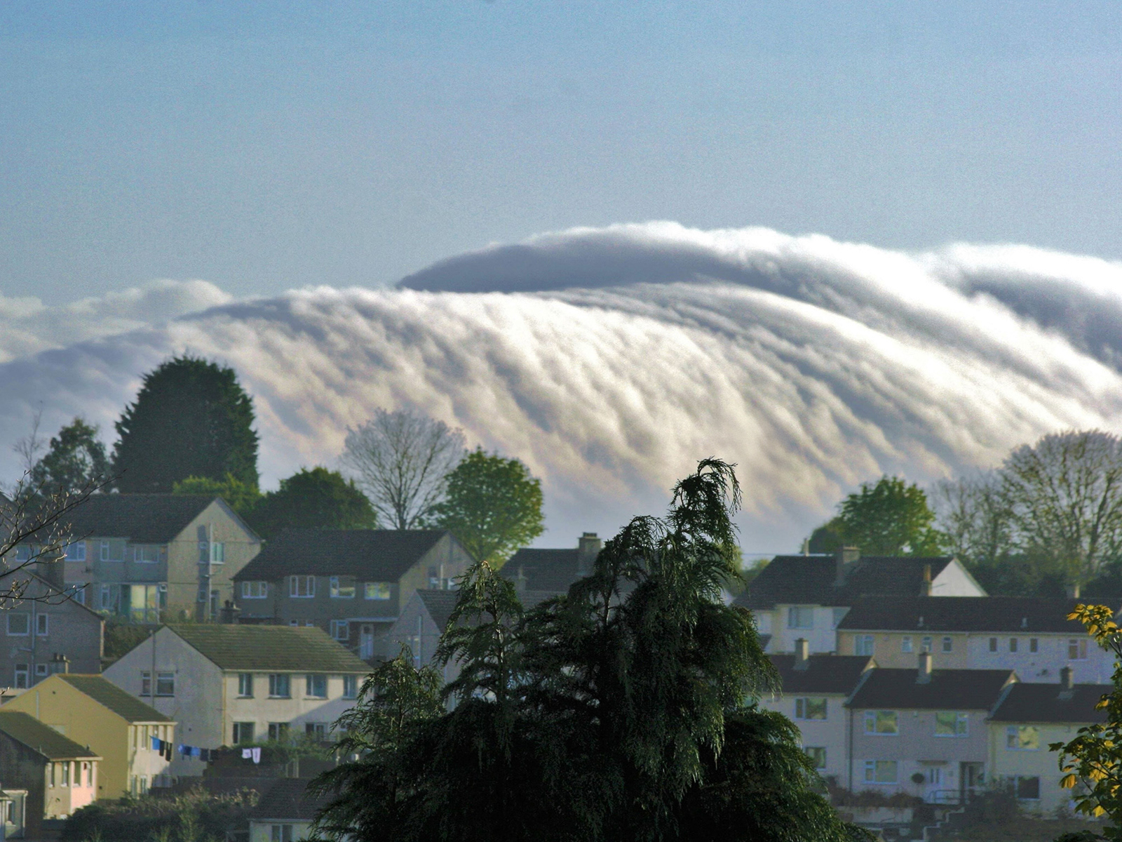 3rd : "Temperature inversion (wave cloud), engulfing Plymouth" by Brian Ottewell