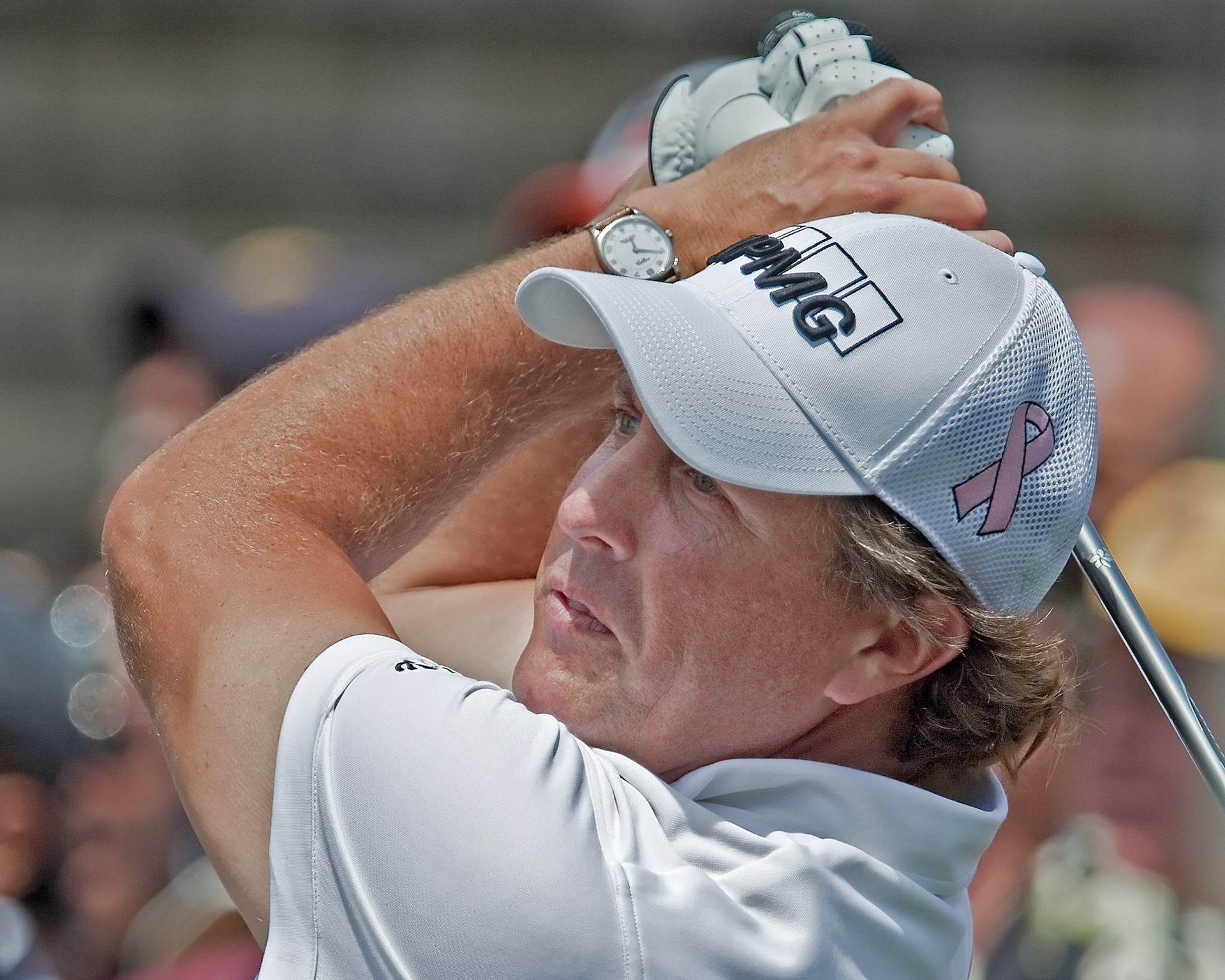 FARMINGDALE, NY - JUNE 17: Phil Mickelson hits a drive on the thrid hole at the black course during the 2009 US Open on June 17, 2009 in Farmingdale, NY. He wears a pink ribbon symbolizing support and awareness for breast cancer his wife and mother are battling.
