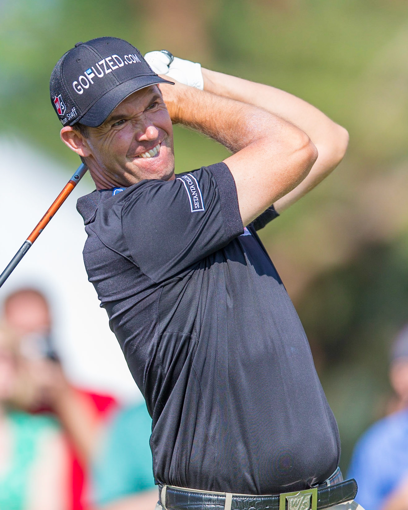 ARDMORE, PA USA- June 12, 2013: Three time major champion winner, Padraig Harrington, hits a drive at the 2013 US Open at Merion  on June 11, 2013 in Ardmore, PA.