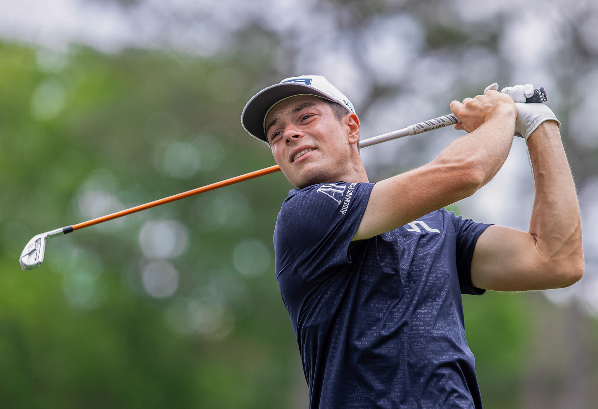 CHARLOTTE, NC , USA  - May 4 , 2021: Viktor Hovland hits a drive as he plays in the 2021 Wells Fargo Championship.